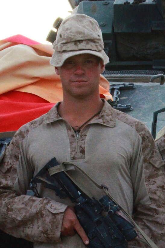 Lance Cpl. Jesse K. Knerr, section leader for 3rd platoon, Company E, 3rd Light Armored Reconnaissance Battalion, poses for a photo at Forward Operating Base Payne, Helmand province, Afghanistan, April 25. Knerr successfully led a fire team of five troops to safety during an ambush.
