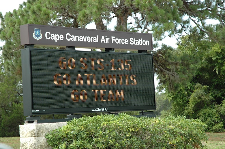 The Cape Canaveral Air Force Station entry marquee on the NASA Causeway congratulates the Launch Team for the final launch of a NASA Space Shuttle July 8, 2011. The successful STS-135 mission by Orbiter Atlantis marked the culmination of three decades of support of the shuttle program by the 45th Space Wing, other Air Force units and government agencies, and their mission partners on the Eastern Range. (U.S. Air Force photo/Eric Brian)
