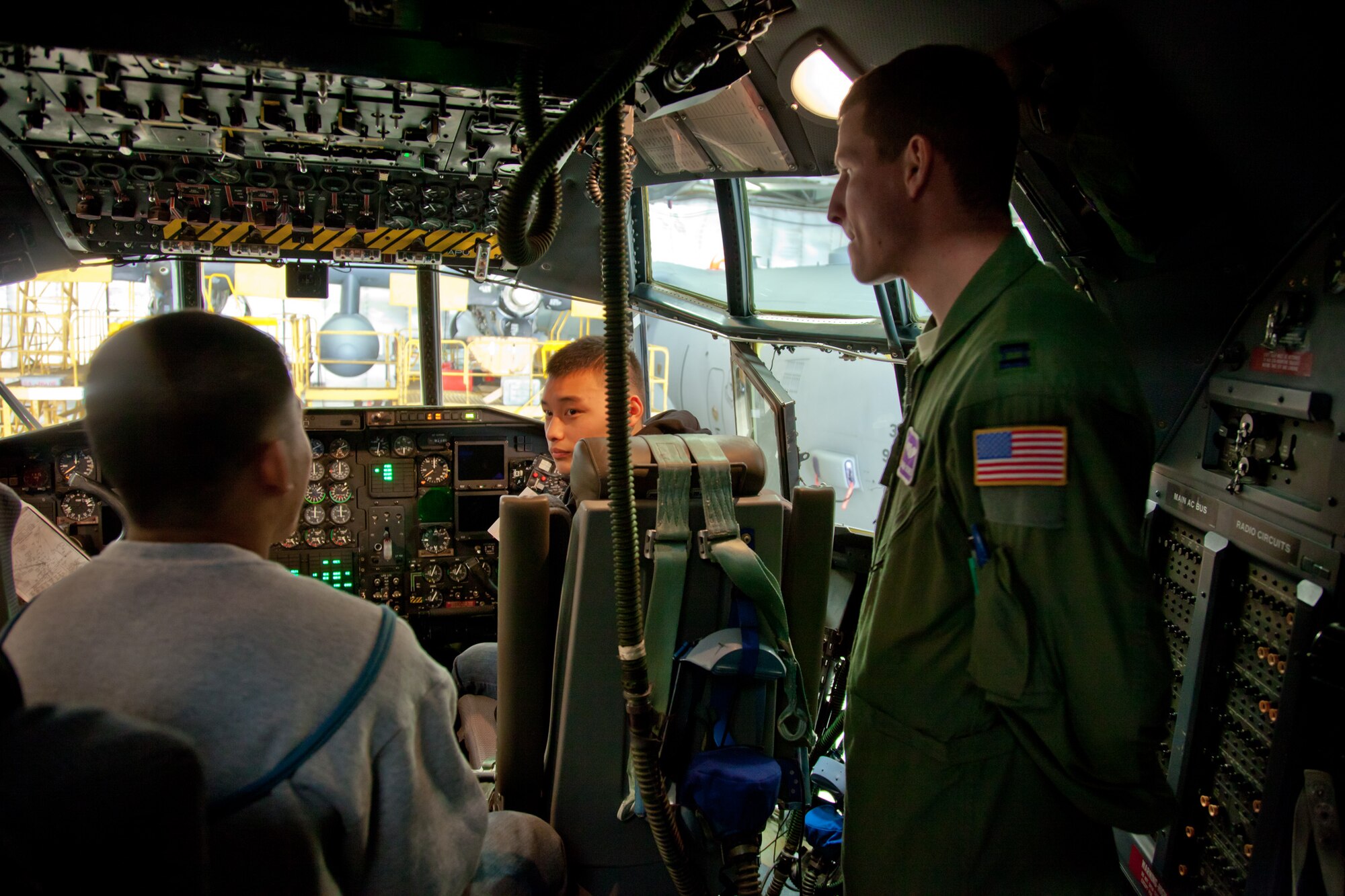 Students from Johnson Senior High School 's Air Force Junior Reserve Officers' Training Corps learn about the flight deck controls from Cpt Dan Schei of the 934th Airlift Wing. The students toured the Minneapolis-St. Paul Air Reserve Station and Air National Guard Museum. The AFJROTC program helps to instill in students in [United States] secondary educational institutions the values of citizenship, service to the United States, and personal responsibility and a sense of accomplishment. (Air Force Photo/Shannon McKay)