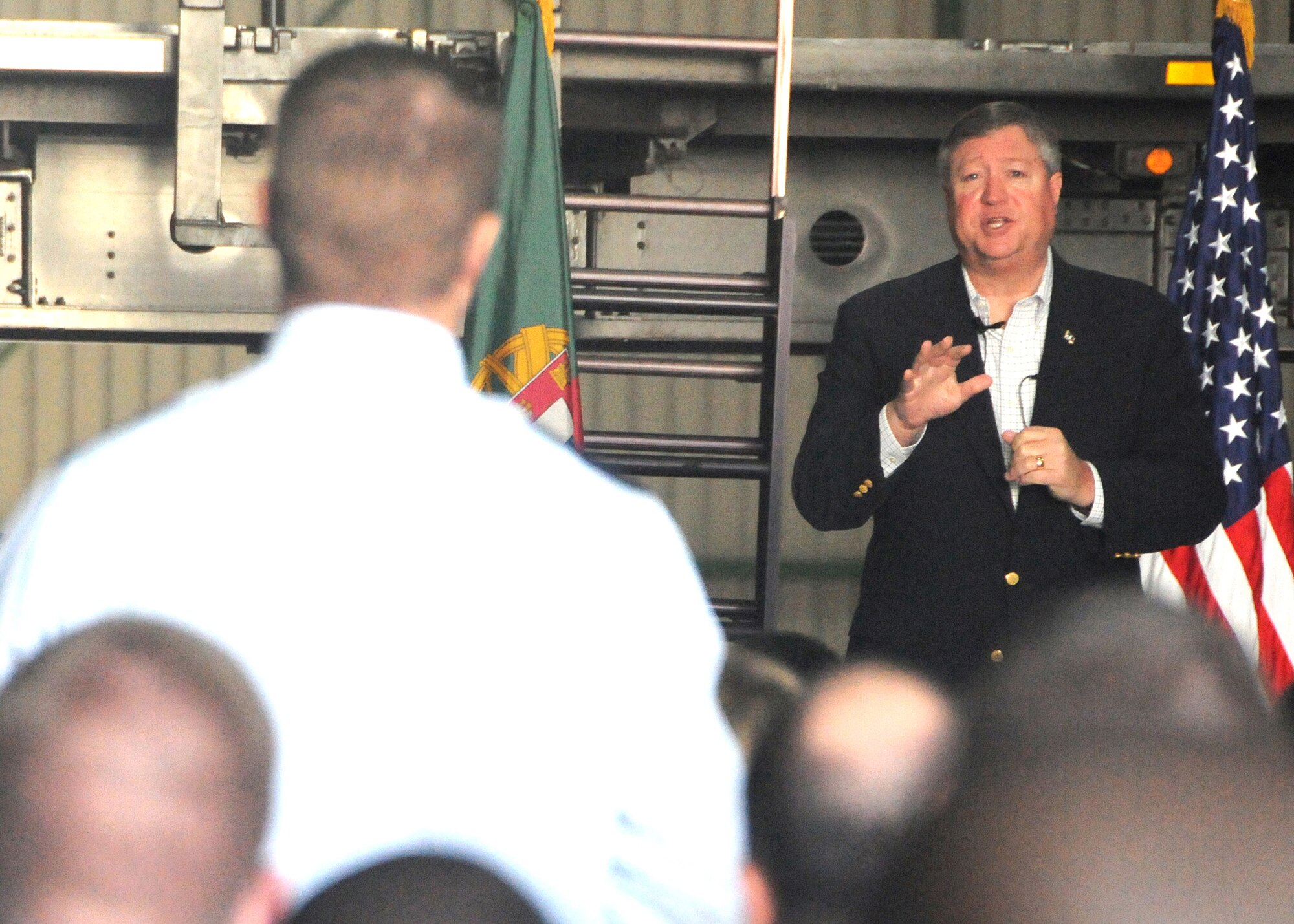Secretary of the Air Force Michael Donley answers a question during an Airmen's Call at Lajes Field, Azores, Dec. 19, 2011. The Secretary thanked Lajes Airmen for their service and countless sacrifices.  (U.S. Air Force photo/Tech. Sgt. Chyrece Campbell)