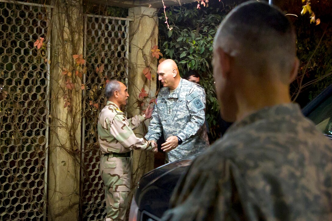 U.S. Army Chief of Staff Gen. Raymond T. Odierno, and U.S. Army Lt. Gen. Robert L. Caslen Jr. meet with Iraqi Chief of Staff Gen. Babakir Zebari in Baghdad, Dec. 22, 2011. Caslen is the commanding general of the Office of Security Cooperation-Iraq.