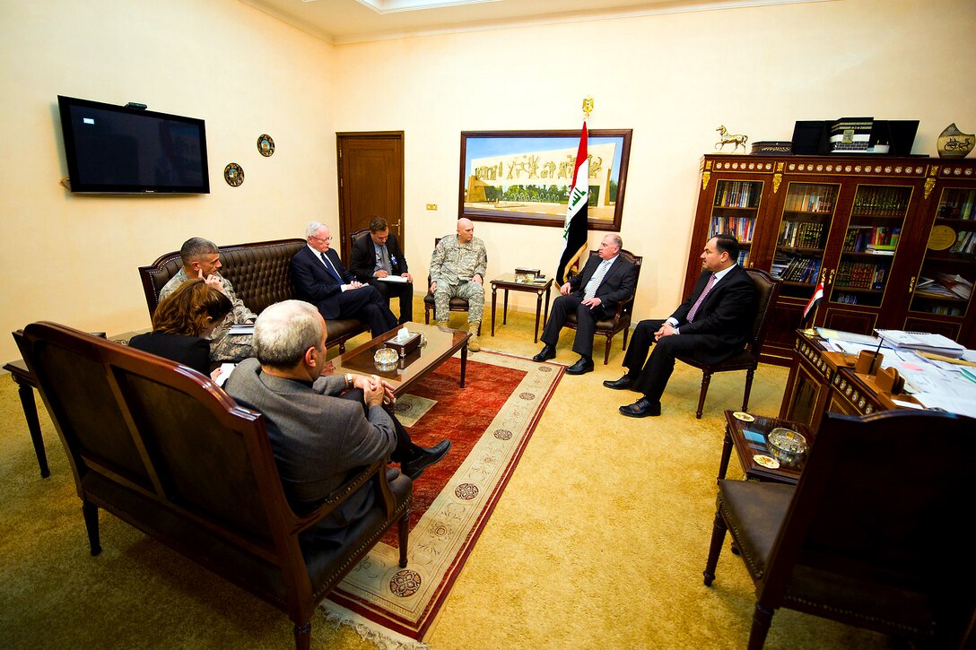 U.S. Army Chief of Staff Gen. Raymond T. Odierno, U.S. Army Lt. Gen. Robert L. Caslen, Jr., and U.S. Ambassador to Iraq James F. Jeffrey meet with Iraqi Council of Representatives Speaker Osama al-Nujaifi and other leaders in Baghdad, Dec. 22, 2011. Caslen is the commanding general of the Office of Security Cooperation-Iraq.