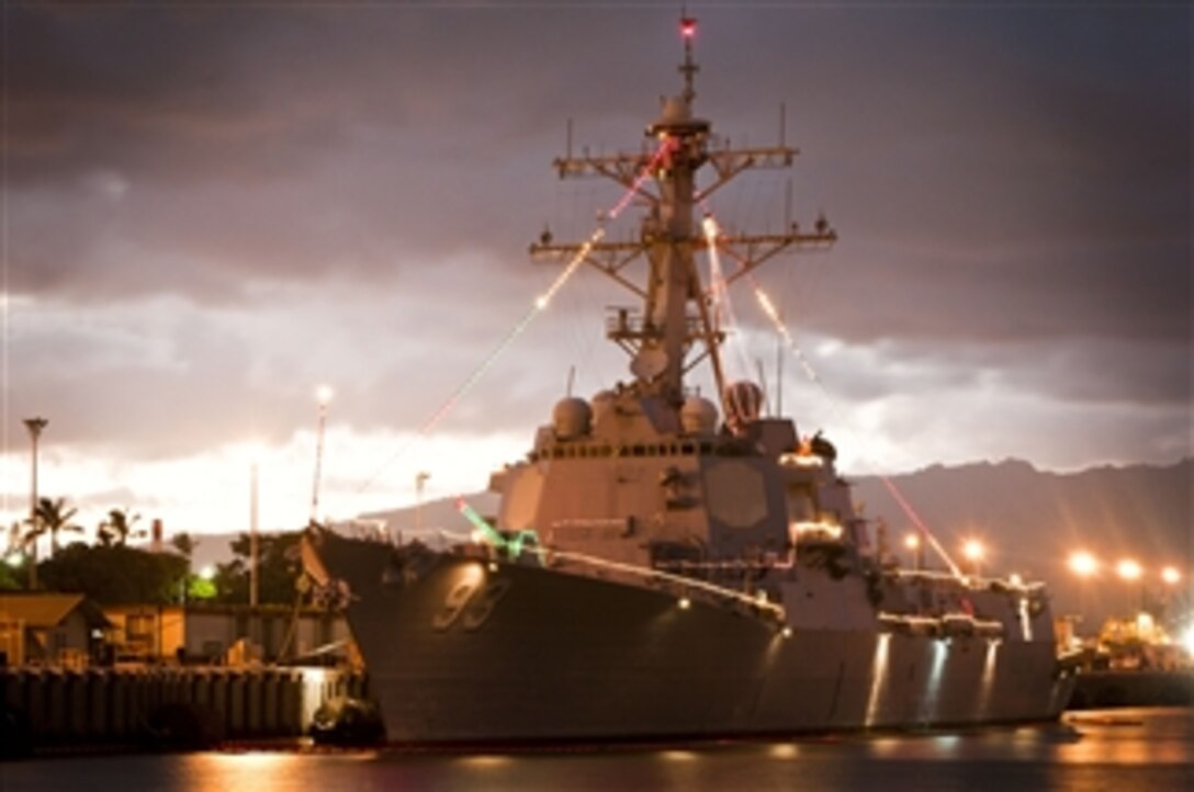 The guided-missile destroyer USS Chung-Hoon (DDG 93) is decorated with Christmas lights at Joint Base Pearl Harbor-Hickam on Dec. 21, 2011.  