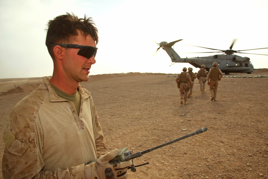 Sgt. Joseph Graham, a forward observer with Fire Control Team 5, Supporting Arms Liaison Team Chuck, 2nd Air-Naval Gunfire Liaison Company, manages Landing Zone Judas at Combat Outpost Shukvani, May 4. Marines with 2nd ANGLICO have spent the past six months partnered with 32nd Georgian Light Infantry Battalion, assisting them with command and control while providing close air support.