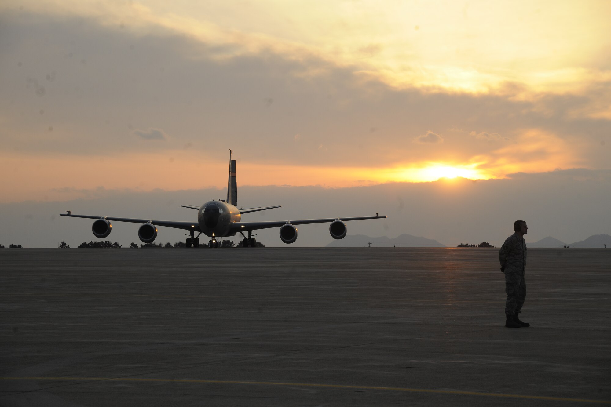 A KC-135 Stratotanker carrying Air Force Chief of Staff Gen. Norton Schwartz taxis to base operations at Kunsan Air Base, Republic of Korea, Dec. 23, 2011. The general and his wife visited Kunsan during the holidays to spend time and spread holiday cheer to Airmen serving on a remote, one-year assignment on the Korean peninsula. (U.S. Air Force photo by Capt. Omar Villarreal/Released)