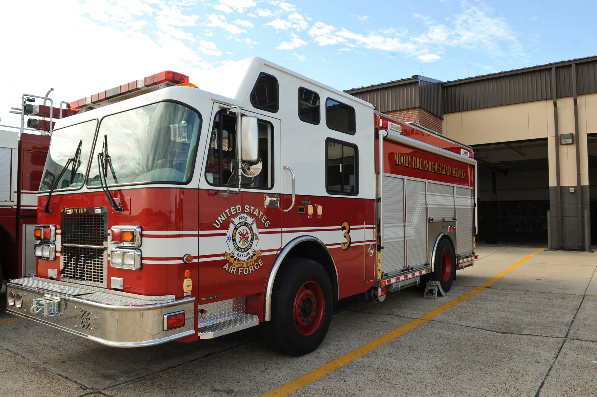A fire truck is parked outside the 23rd Civil Engineer Squadron at Moody Air Force Base, Ga., Dec. 20, 2011. During the holiday season, the fire department will remain on duty working 48 hour rotating shifts.(U.S. Air Force photo by Airman 1st Class Olivia Dominique/Released)