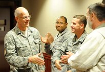 LAUGHLIN AIR FORCE BASE, Texas -- Chief Master Sgt. Mike Hanning, former command chief of the 47th Flying Training Wing and the 9th Air and Space Expeditionary Task Force-Iraq and Air Component Coordination Element-Iraq, is welcomed home by fellow chiefs and the Laughlin community here Dec. 21. Hanning served as the senior U.S. Air Force enlisted representative in Iraq. (U.S. Air Force photo/Airman 1st Class Nathan L. Maysonet)