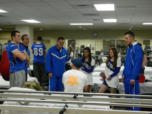 Cadets listen to U.S. Army Staff Sgt. Brian Mast while he sits in the rehabilitation room of Walter Reed National Military Medical Center Bethesda. Sergeant Mast had this advice for the cadets. “They’ve got a lot of good guys who came before them and they have to keep up the tradition of honorable service.” (U.S. Air Force Photo/Leslie Finstein) 