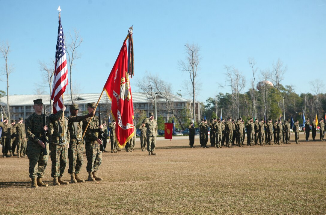 The color guard for 8th Engineer Support Battalion, 2nd Marine Logistics Group presents the colors during a change of command ceremony at Soifert Field aboard Camp Lejeune, N.C., Dec. 29, 2011. During the ceremony, Lt. Col. Christopher G. Downs, the outgoing commanding officer, relinquished his authority of the unit to Lt. Col. Ferdinand F. Llantero. (U.S. Marine Corps photo by Pfc. Franklin E. Mercado)