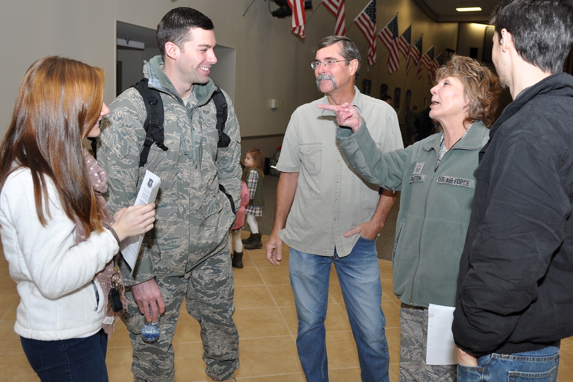 Master Sgt. Tina Chasteen, career advisor for the 307th Operations Group, gives her son, Senior Airman Michael Chasteen, a final piece of advice at Hoban Hall on Barksdale Air Force Base, La., Dec. 28, 2011. Airman Chasteen is just one of approximately 124 Airmen who deployed from the 917th Fighter Group to Afghanistan in support of Operation Enduring Freedom. Airman Chasteen’s girlfriend Tiffany Hudson, his father, Gary, and his brother Mark, were all on hand to see him off for his first deployment. The 917th FG is an A-10 Thunderbolt II Air Force Reserve unit. (U.S. Air Force photo by Master Sgt. Jeff Walston)