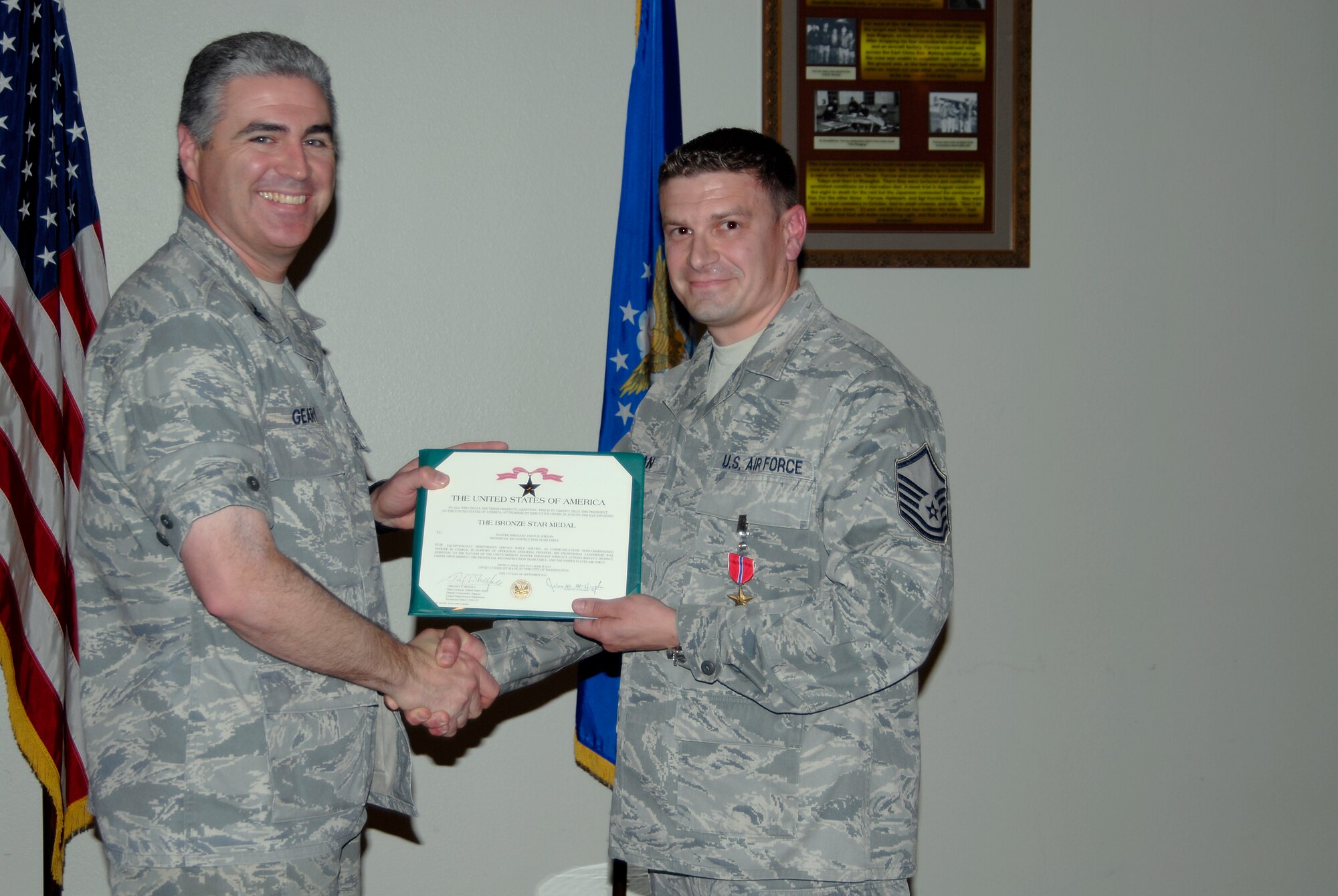 GOODFELLOW AIR FORCE BASE, Texas — Col. Thomas Geary, then 17th Training Wing Commander presents Master Sgt. Jason B. Jordan, 17th Training Support Squadron, with a Bronze Star April 8, 2011 for exceptionally meritorious service while deployed to Afghanistan in support of Operation Enduring Freedom. (U.S. Air Force photo/Airman 1st Class Jessica Keith)