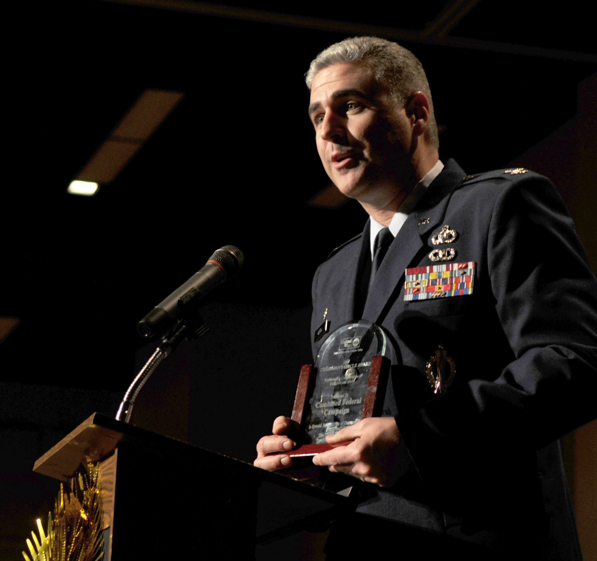 GOODFELLOW AIR FORCE BASE, Texas-- Col. Thomas Geary, then 17th Training Wing Commander, expresses his gratitude after receiving an award from the community at the United Way 2010 Campaign luncheon Mar 10, 2011. Colonel Geary was presented with the Chairman's Circle Award on behalf of Team Goodfellow's participation in the Combined Federal Campaign. (U.S. Air Force photo/Staff Sgt. Heather L Rodgers)