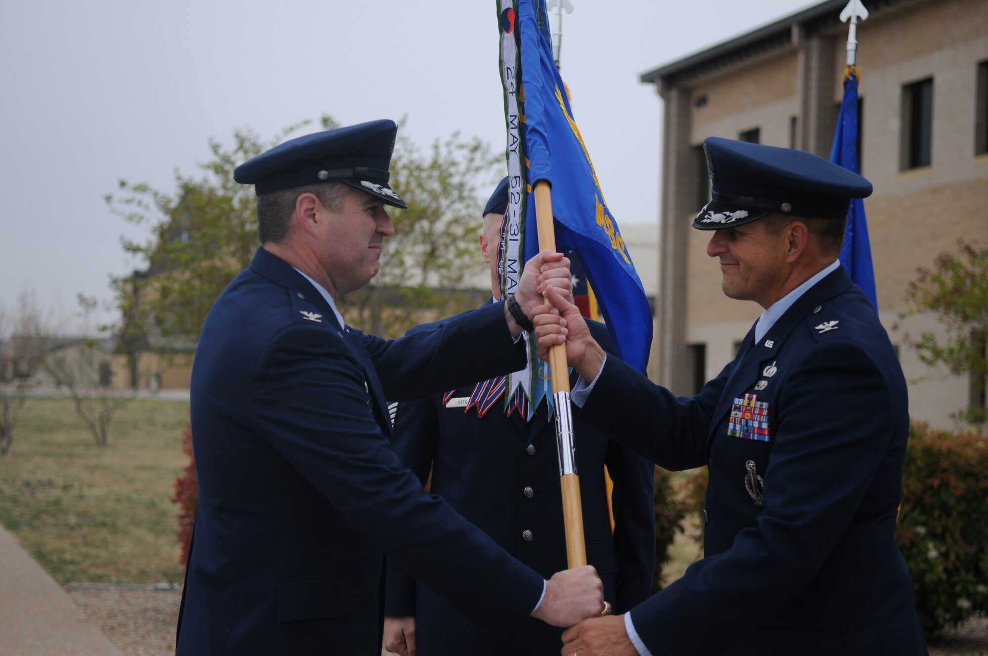 GOODFELLOW AIR FORCE BASE, Texas- Col. Paul Bugenske assumes the reigns of the 17th Mission Support Group March 28, 2011 during a ceremony in front of the Norma Brown building here. He was previously assigned to Kirtland Air Force Base, N.M., where he served as the Director of Contracting. (U.S. Air Force photo/Staff Sgt. Heather Rodgers)