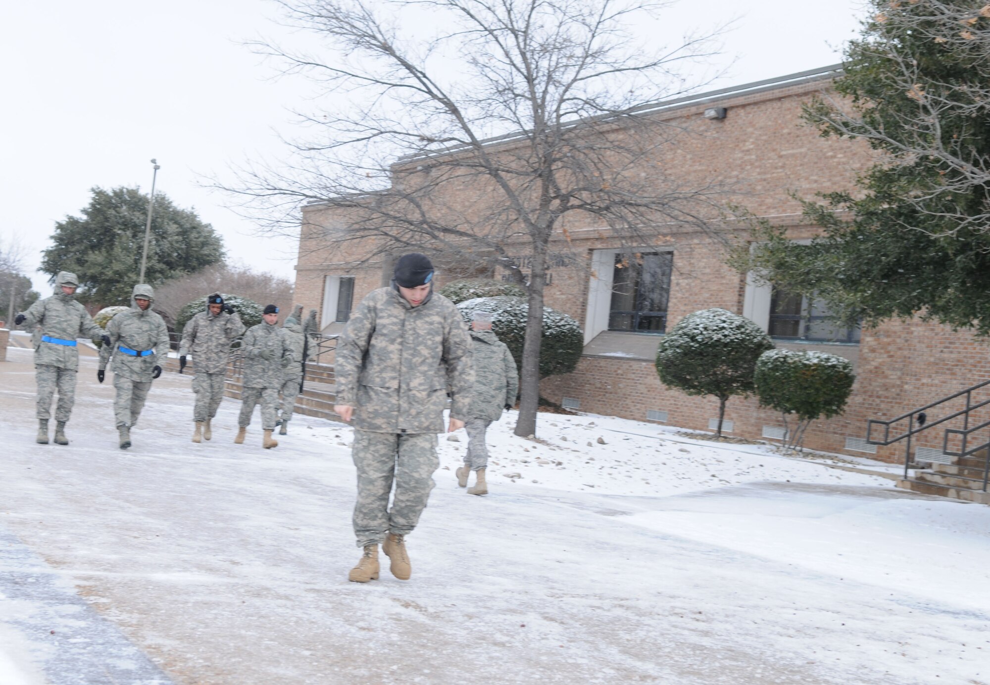 GOODFELLOW AIR FORCE BASE, Texas- Members of Team Goodfellow battle the weather to continue normal base operations, Feb. 1. Nearly two inches of snow and ice fell in the San Angelo area. (U.S. Air Force photo/Staff Sgt. Heather Rodgers)photo)