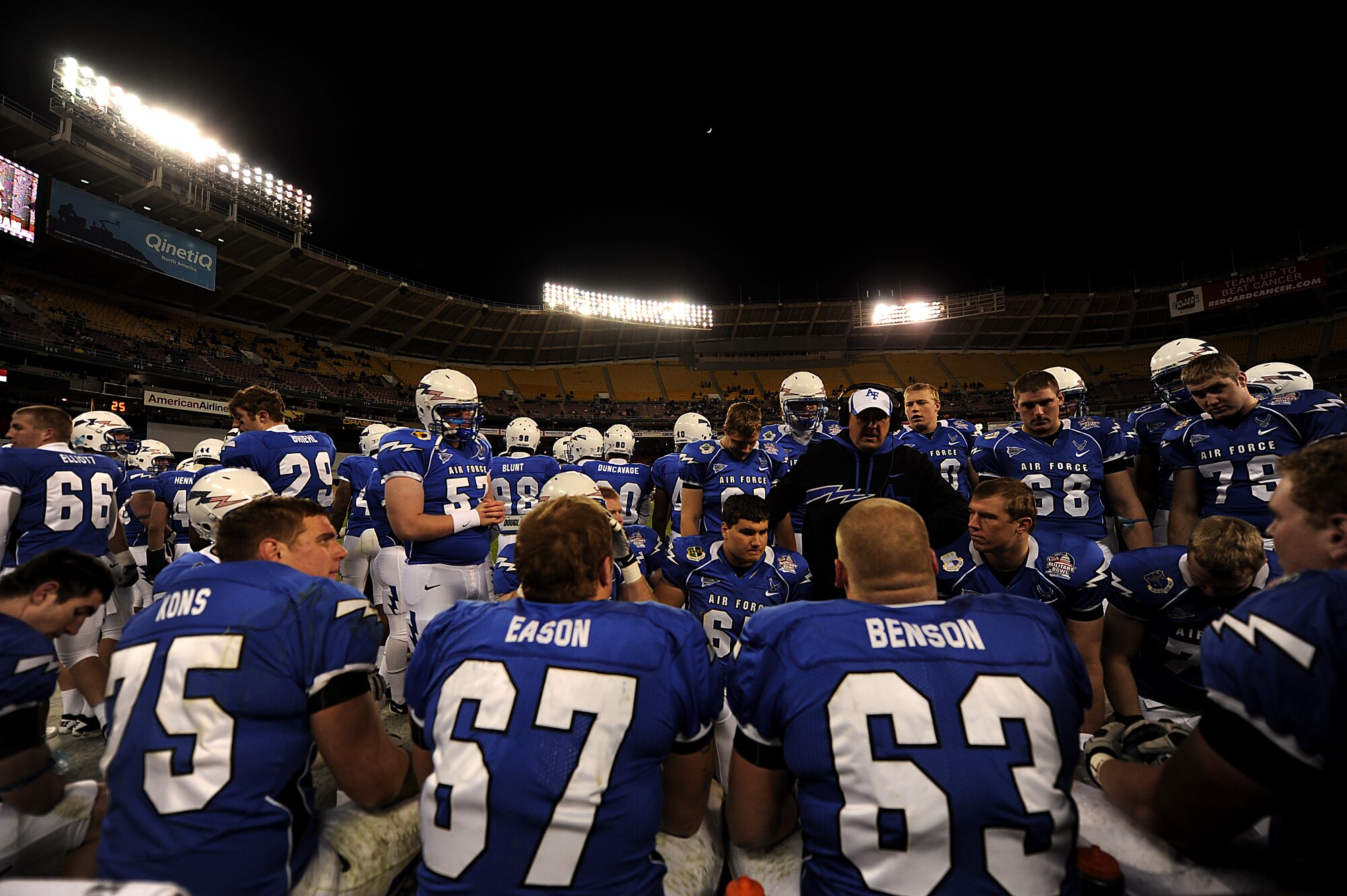 The U.S. Air Force Academy football team listens to the coach in between plays during their game against Toledo University on December 28, 2011 at RFK stadium for the 2011 Military Bowl. Toledo won the game with a 42-41 victory. (U.S. Air Force Photo by: MSgt Jeremy Lock) (Released)

