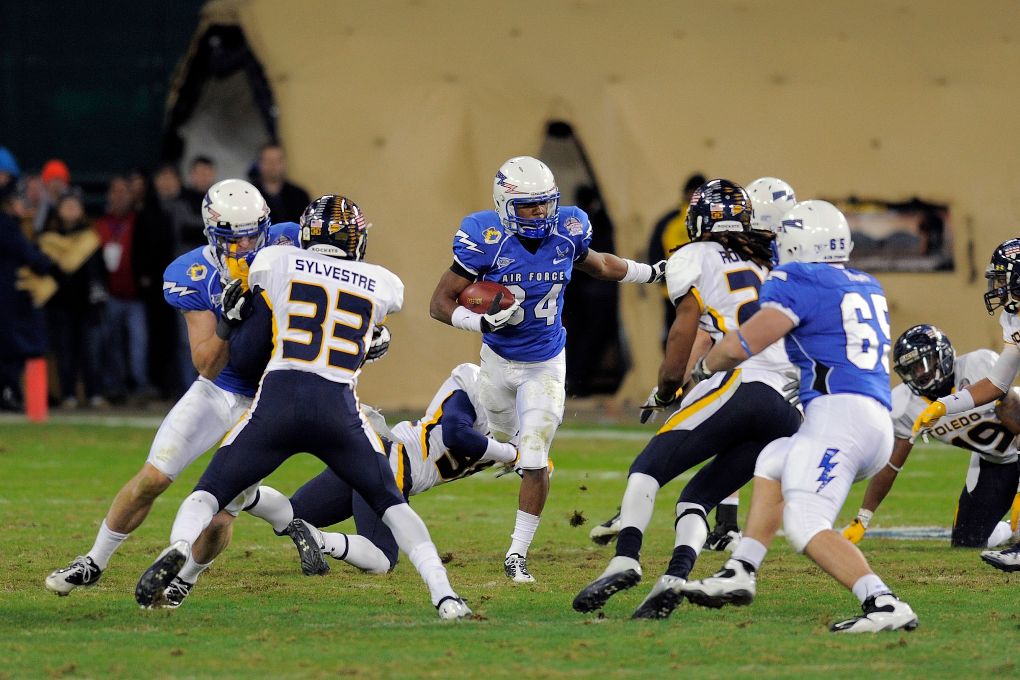 Tim Jefferson runs the option for the Air Force Academy at RFK Stadium Dec 28, 2011 in Washington DC.  The Falcons played the Toledo Rockets in the Military Bowl.   (Air Force photo/Ray McCoy)