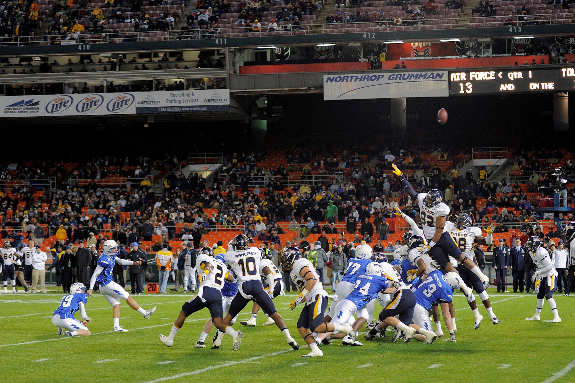 Parker Herrington splits the uprights for a fieldgoal for the Air Force Academy at RFK Stadium Dec 28, 2011 in Washington DC.  The Falcons played the Toledo Rockets in the Military Bowl.   (Air Force photo/Ray McCoy)