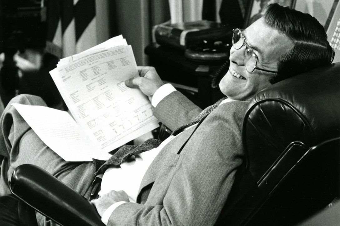 Defense Department photographer Robert D. Ward took this photo of Defense Secretary Donald H. Rumsfeld working at his desk, May 31, 1976.  Rumsfeld, at age 43, was the youngest man to serve as the secretary of defense. Returning to the post in 2001, he also became the oldest, at age 69. Ward retired Dec. 30, 2011, after spending decades as an official photographer to 12 secretaries of defense, including Rumsfeld twice.