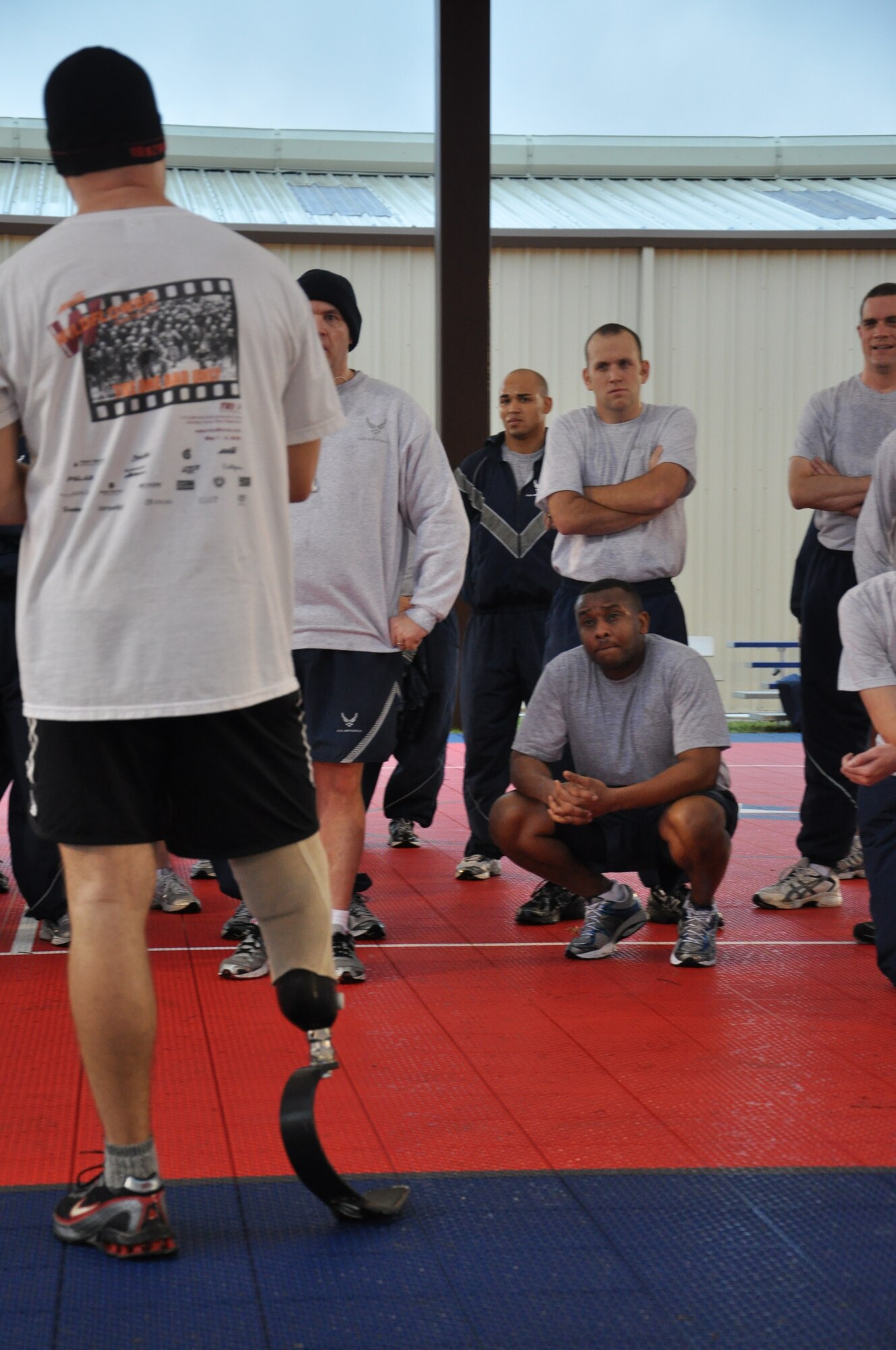 LACKLAND AIR FORCE BASE, Texas — Chad Crittenden, part of the American300 Warrior Tour and a CBS’ Survivor contestant, talks to members of 24th Air Force after working out with them here Dec. 19. The American300 Warrior Tours is an all-volunteer, nonprofit organization dedicated to raising the resiliency of American military members, their families and the communities in which they live. (U.S. Air Force photo by William Parks)