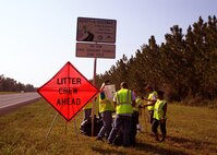 Air Force reservists from Duke Field, Fla., rally to begin removing litter along State Road 85 near the base recently. More than a dozen 919th Special Operations Wing volunteers worked for several hours on the First Sergeants Council’s Adopt-A-Highway Program cleanup project that removed more than 500 pounds of litter to help beautify the busy route between the nearby communities of Niceville and Crestview. (Courtesy photo)