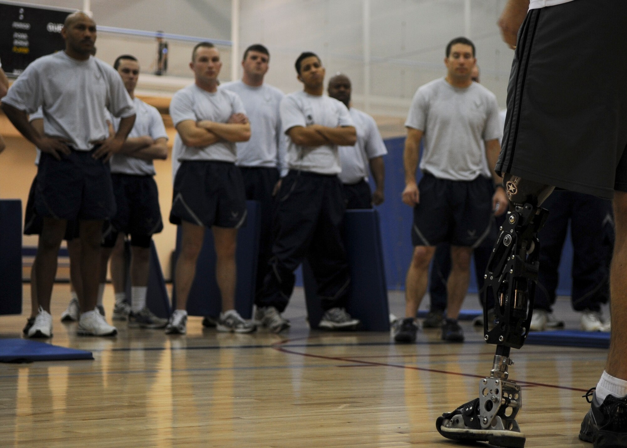MINOT AIR FORCE BASE, N.D. – Minot Airmen listen to an American300 motivational speaker here, Dec. 14. The American300 tour consists of amputees who  fought through their physical disabilities to become outstanding athletes. The purpose of the tour is to encourage and build resiliency among U.S. Forces around the world. (U.S. Air Force photo/Senior Airman Ashley N. Avecilla)