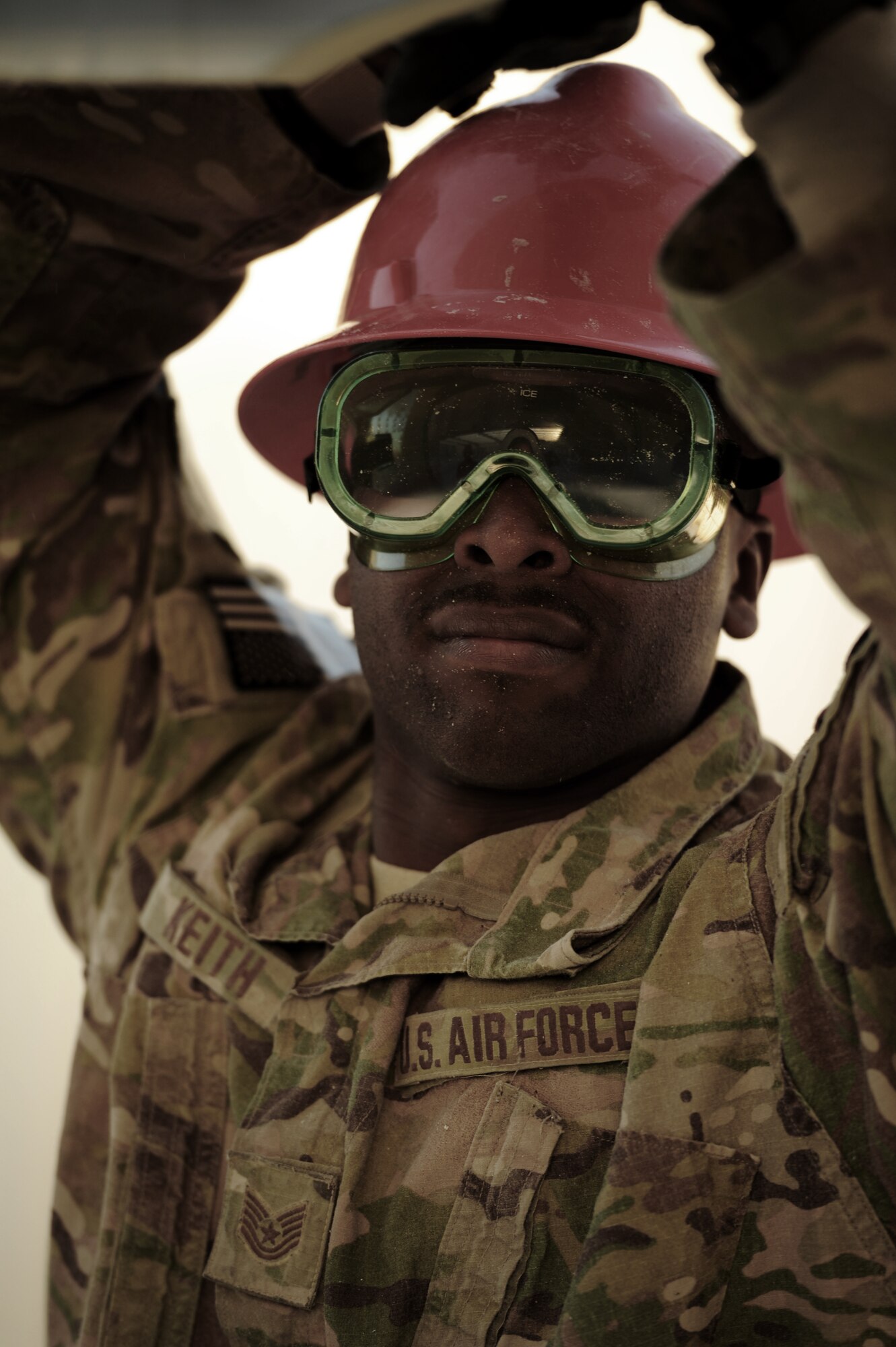 SOUTHWEST ASIA – Tech. Sgt. Kevin Keith, 557th Expeditionary RED HORSE Squadron team member and native of Pittsboro, N.C., saws a window opening on a new RED HORSE facility here Dec. 28, 2011. The building will allow the 1st Expeditionary RED HORSE Group to consolidate all headquarters functions in one location. RED HORSE stands for Rapid Engineer Deployable, Heavy Operations Repair Squadrons, Engineer. (U.S. Air Force photo/Staff Sgt. Nathanael Callon) 