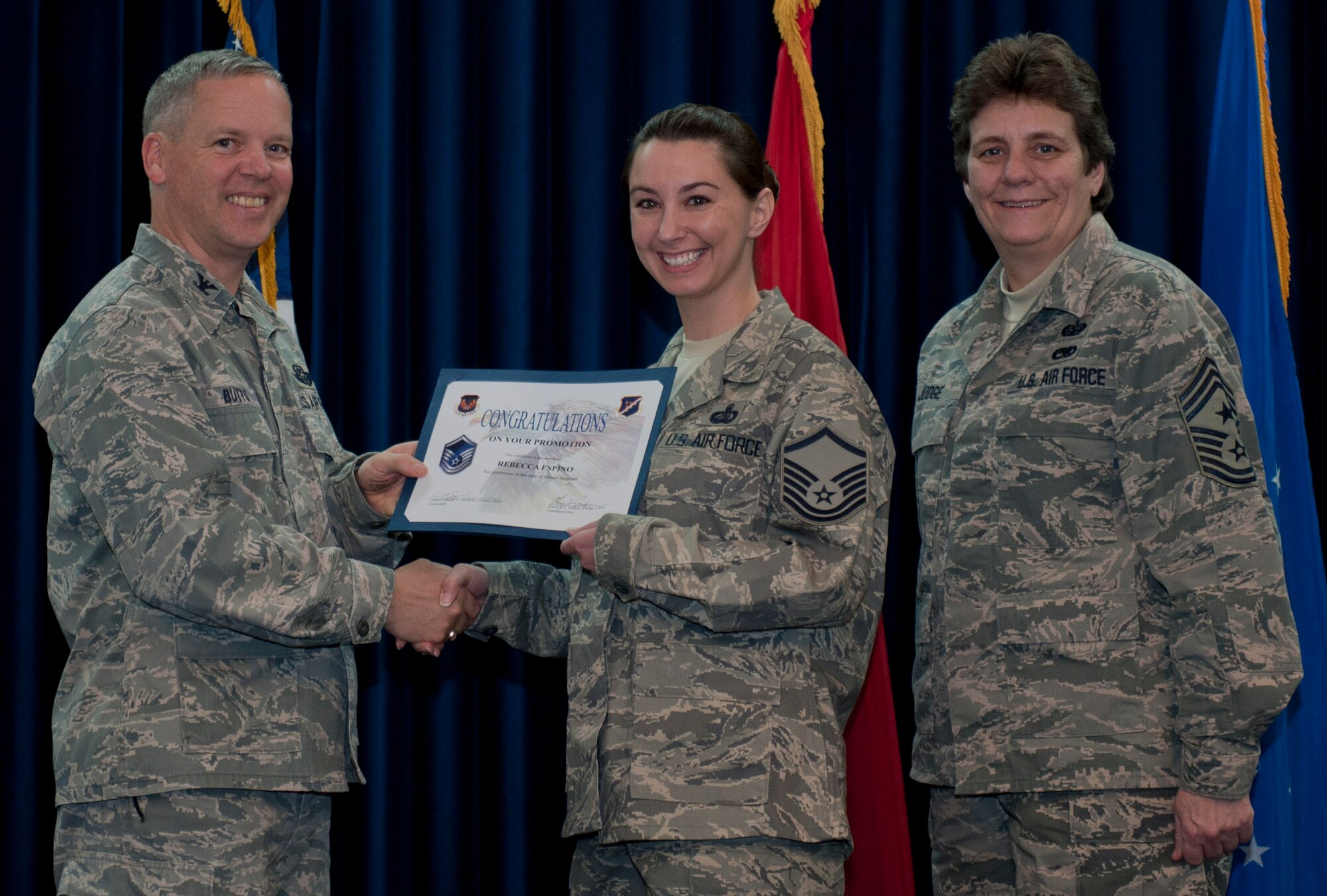 Rebecca Espino, 39th Force Support Squadron, is promoted to the rank of master sergeant Dec. 29, 2011, in the Club Complex ballroom at Incirlik Air Base, Turkey. (U.S. Air Force photo by Senior Airman Anthony Sanchelli/Released)
