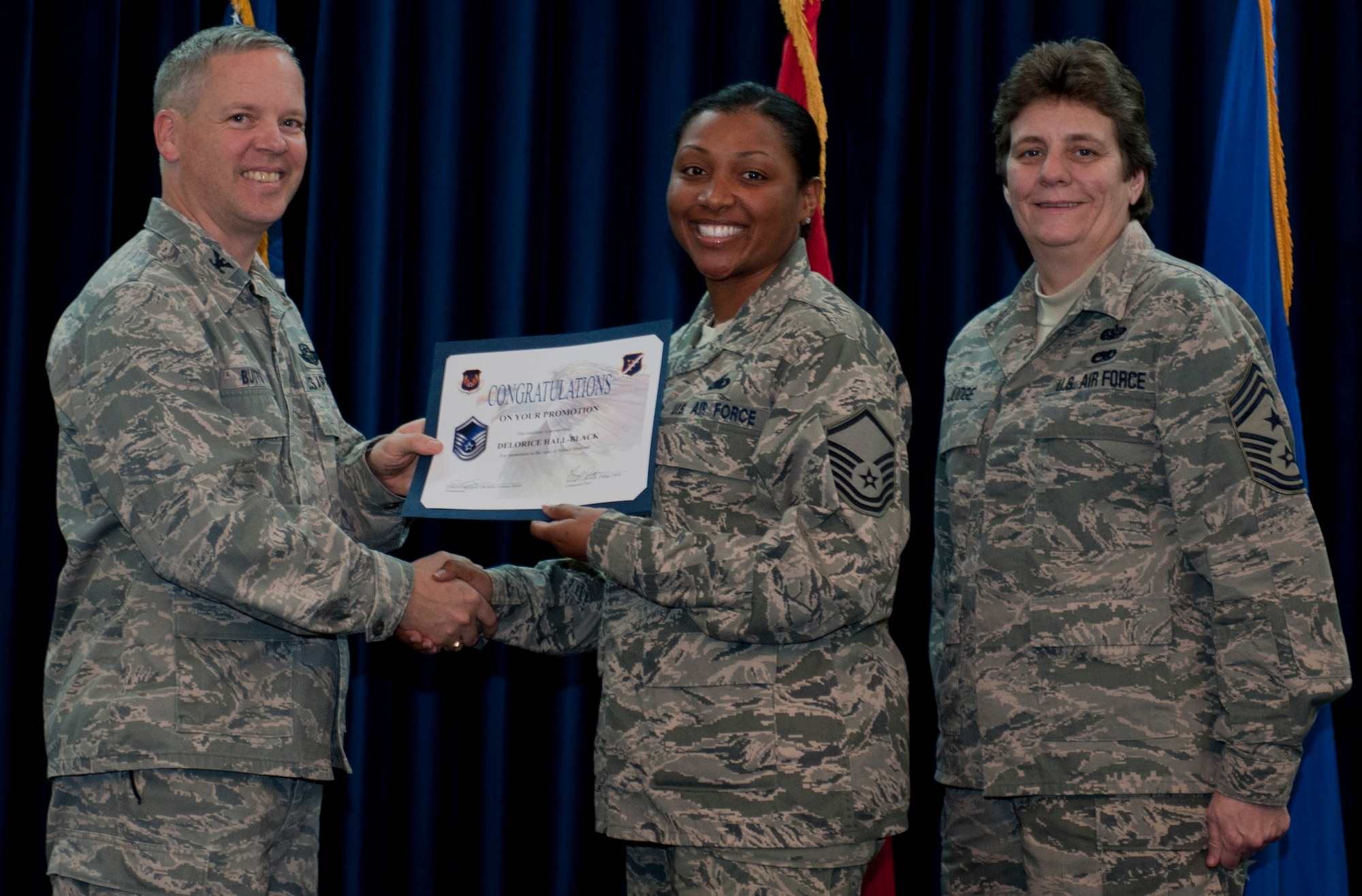 Delorice Hall-Black, 39th Logistics Readiness Squadron, is promoted to the rank of master sergeant Dec. 29, 2011, in the Club Complex ballroom at Incirlik Air Base, Turkey. (U.S. Air Force photo by Senior Airman Anthony Sanchelli/Released)
