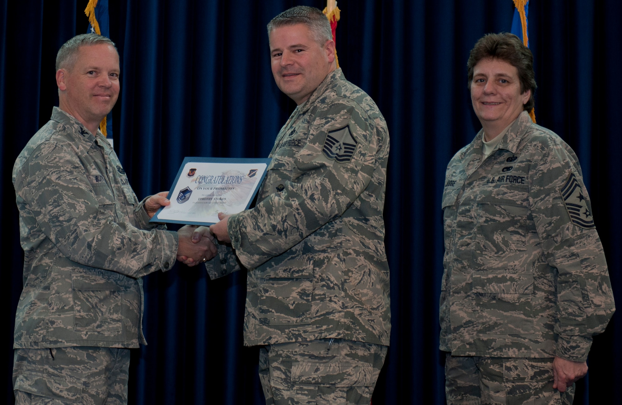 Timothy Stokes, 39th Security Forces Squadron, is promoted to the rank of master sergeant Dec. 29, 2011, in the Club Complex ballroom at Incirlik Air Base, Turkey. (U.S. Air Force photo by Senior Airman Anthony Sanchelli/Released)
