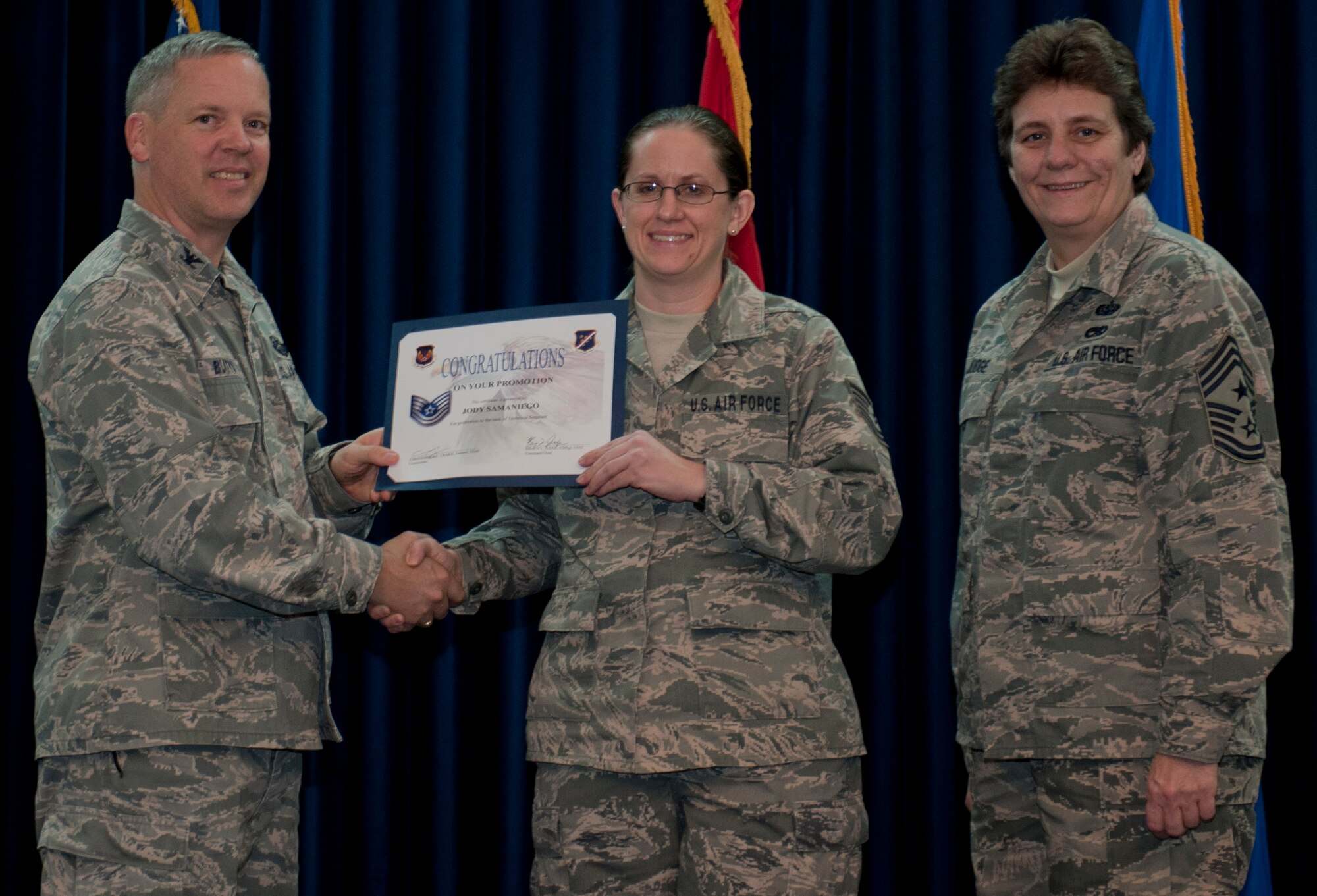 Jody Samaniego, 39th Communications Squadron, is promoted to the rank of technical sergeant Dec. 29, 2011, in the Club Complex ballroom at Incirlik Air Base, Turkey. (U.S. Air Force photo by Senior Airman Anthony Sanchelli/Released)
