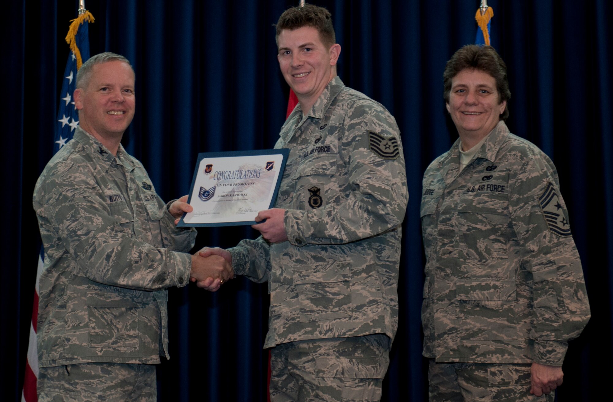 Aaron Karwaski, 39th Security Forces Squadron, is promoted to the rank of technical sergeant Dec. 29, 2011, in the Club Complex ballroom at Incirlik Air Base, Turkey. (U.S. Air Force photo by Senior Airman Anthony Sanchelli/Released)
