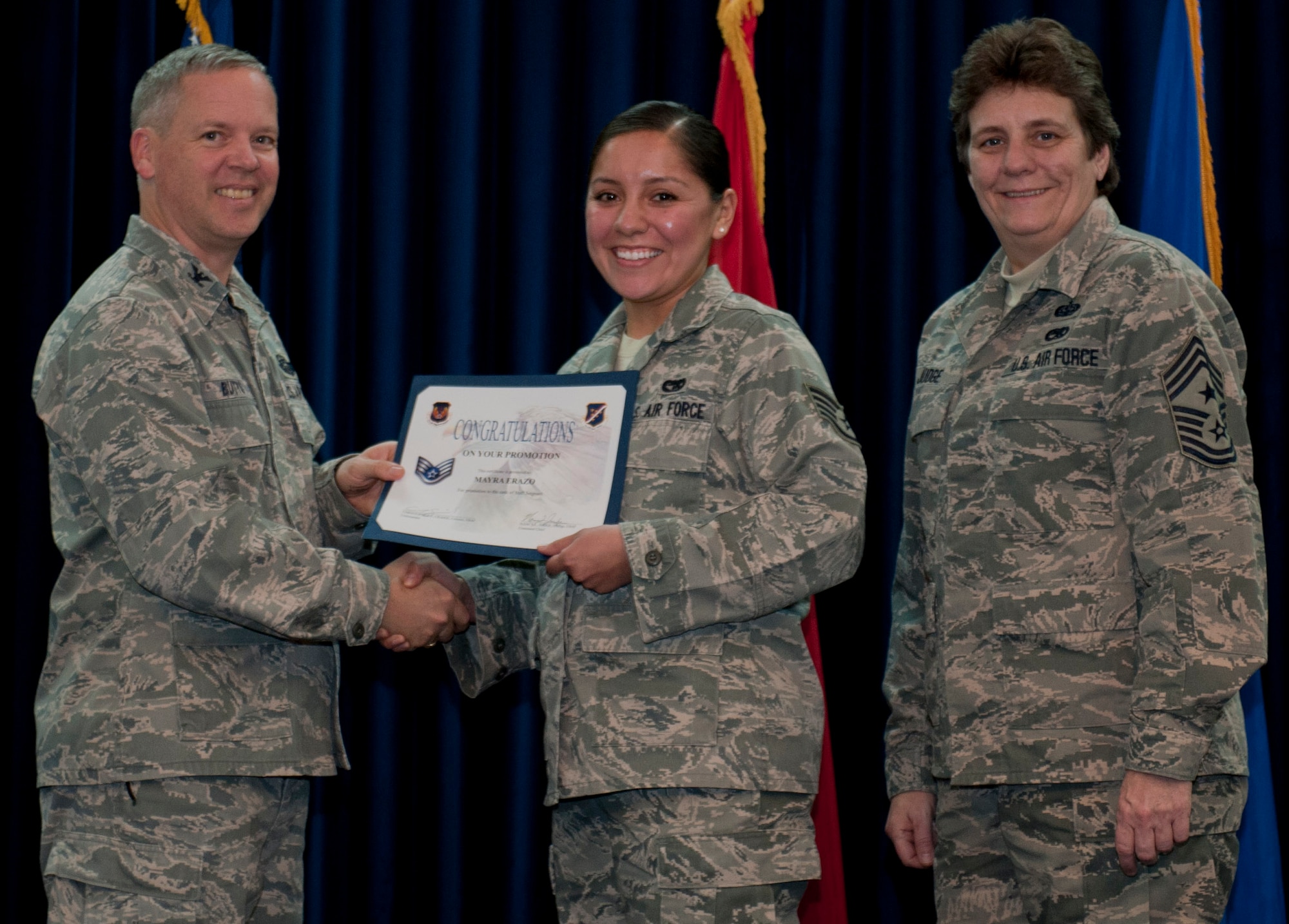Mayra Erazo, 39th Logistics Readiness Squadron, is promoted to the rank of staff sergeant Dec. 29, 2011, in the Club Complex ballroom at Incirlik Air Base, Turkey. (U.S. Air Force photo by Senior Airman Anthony Sanchelli/Released)
