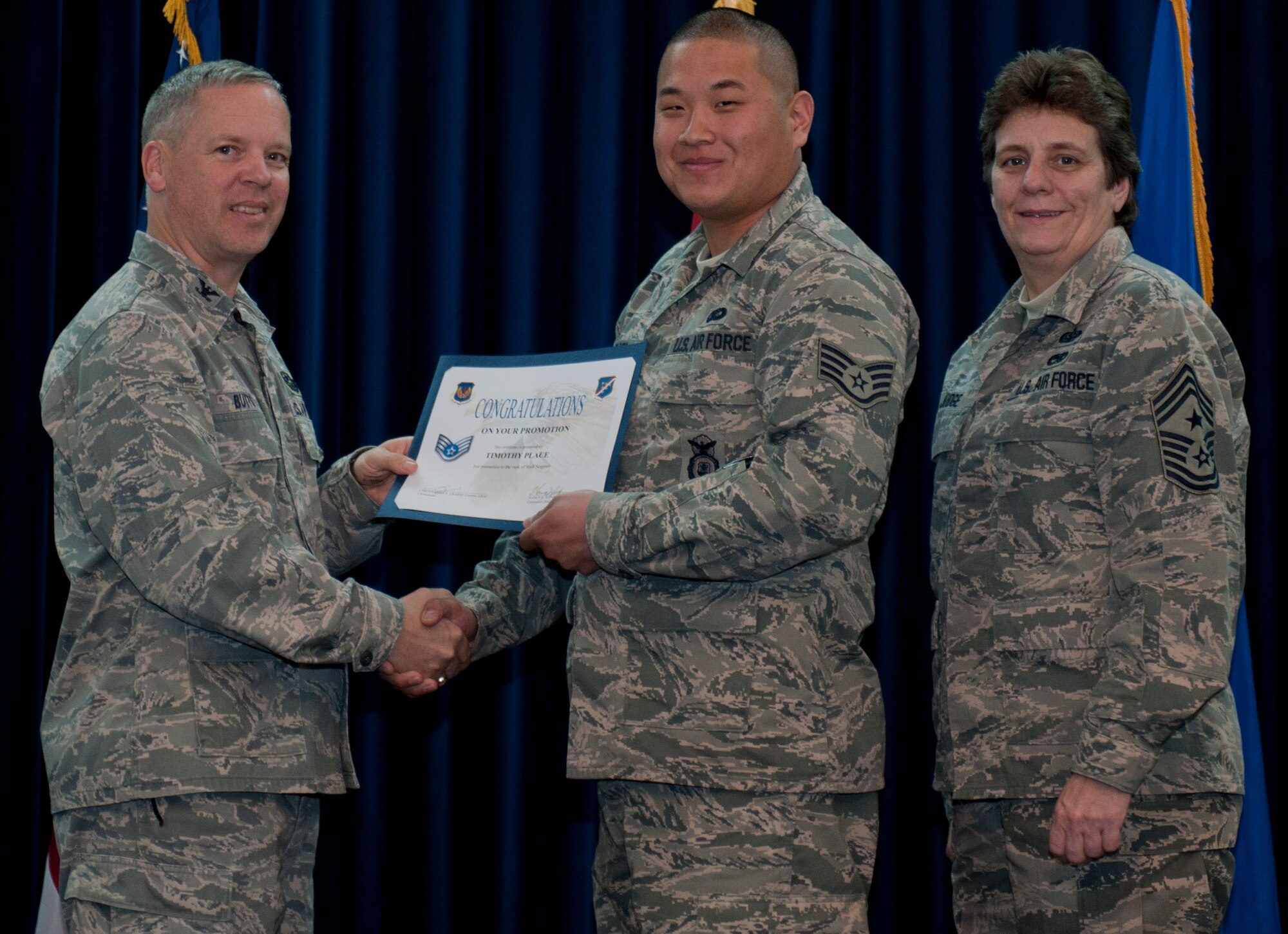 Timothy Place, 39th Security Forces Squadron, is promoted to the rank of staff sergeant Dec. 29, 2011, in the Club Complex ballroom at Incirlik Air Base, Turkey. (U.S. Air Force photo by Senior Airman Anthony Sanchelli/Released)
