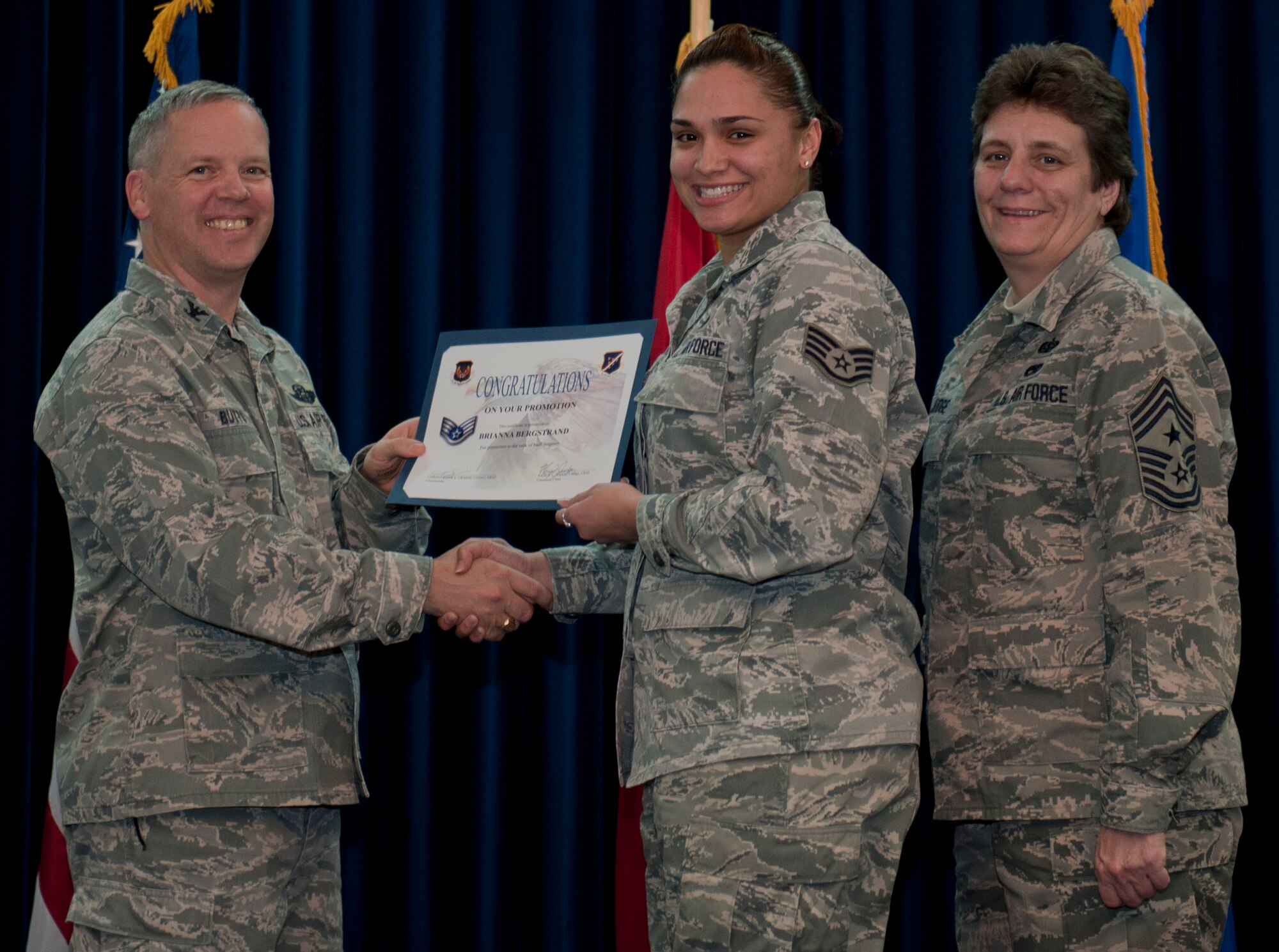 Brianna Bergstrand, 39th Air Base Wing, is promoted to the rank of staff sergeant Dec. 29, 2011, in the Club Complex ballroom at Incirlik Air Base, Turkey. (U.S. Air Force photo by Senior Airman Anthony Sanchelli/Released)
