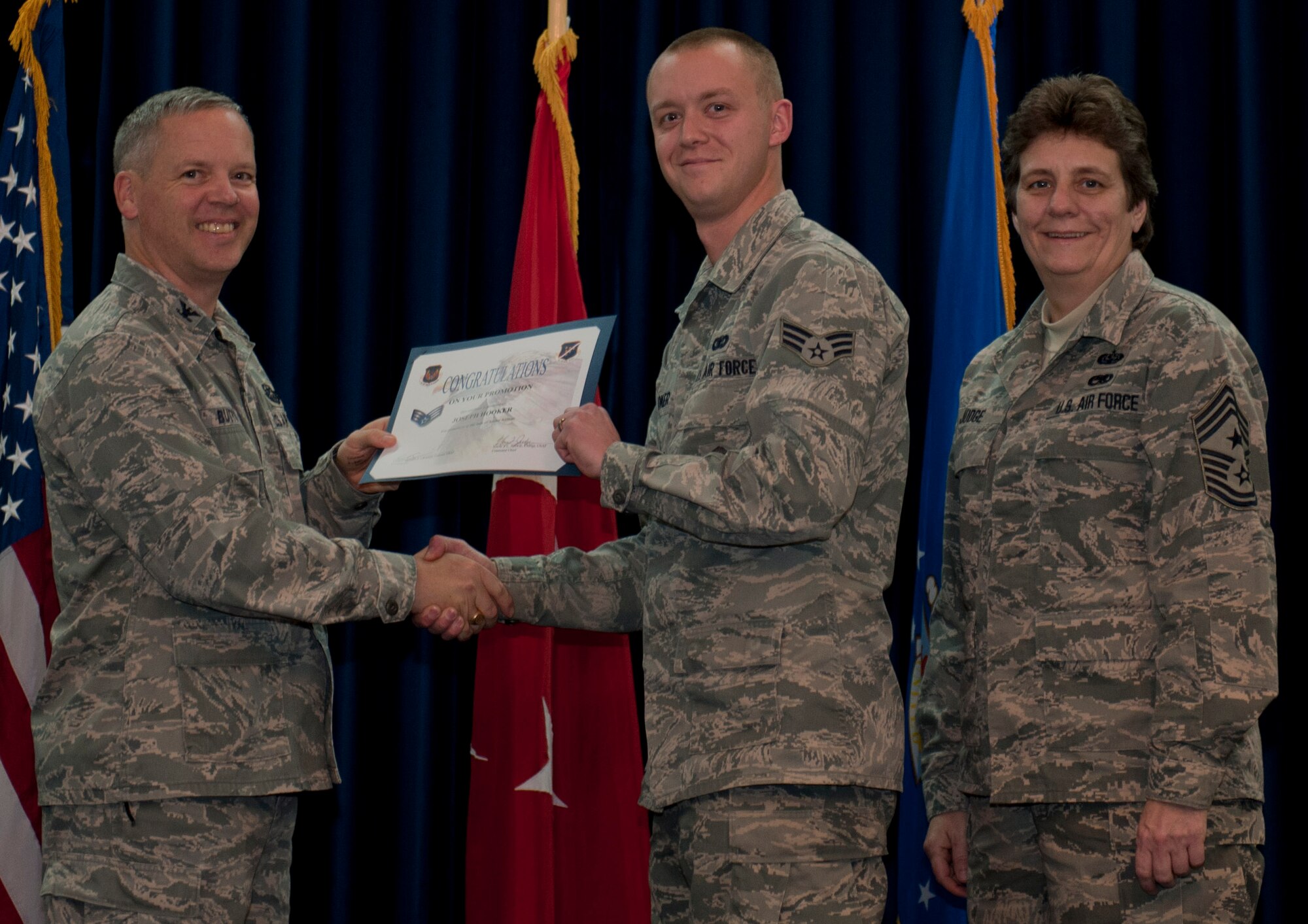 Joseph Hooker, 39th Security Forces Squadron, is promoted to the rank of senior airman Dec. 29, 2011, in the Club Complex ballroom at Incirlik Air Base, Turkey. (U.S. Air Force photo by Senior Airman Anthony Sanchelli/Released)
