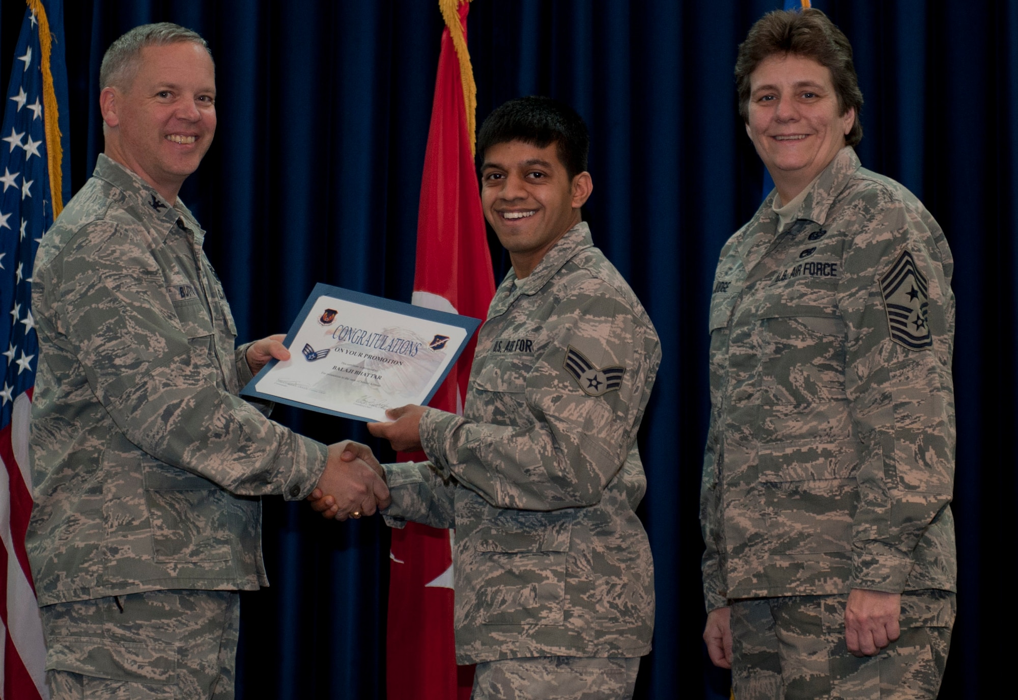 Balaji Bhattar, 39th Medical Operations Squadron, is promoted to the rank of senior airman Dec. 29, 2011, in the Club Complex ballroom at Incirlik Air Base, Turkey. (U.S. Air Force photo by Senior Airman Anthony Sanchelli/Released)
