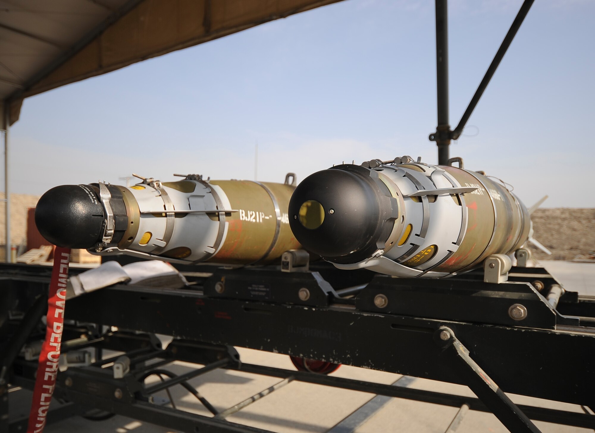 Two bombs lie ready to rejoin the munitions stock following an assembled munitions serviceability inspection by the 455th Expeditionary Maintenance Squadron at Bagram Airfield, Afghanistan, Dec. 28, 2011.  Ammo Dawgs disassembled the two bombs and checked their components to ensure the bombs would work when deployed.   Throughout December, the Ammo team inspected 22 bombs and performed 355 post load visual and integrated built-in test inspections on bombs that were unloaded from aircraft due to aircraft maintenance.  (U.S. Air Force photo/Tech. Sgt. Vernon Cunningham)
