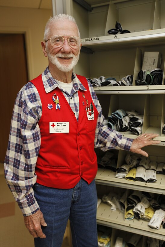 Retired Master Gunnery Sgt. Charles Miller, Red Cross volunteer at Naval Health Clinic Cherry Point, stands in the clinic’s optometry section at the Feb. 1.  Miller, who is affectionately known as ‘Chuck’ at the clinic, has volunteered there for almost nine years.