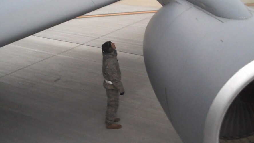 A 916th Air Refueling Wing maintainer gives the jet a good look upon arrival in Georgia. The wing undergoes an Operational Readiness Inspection this week in which they will be graded on their ability to survive and operate in a wartime environment. (USAF photo by Maj. Shannon Mann, 916ARW.PA)