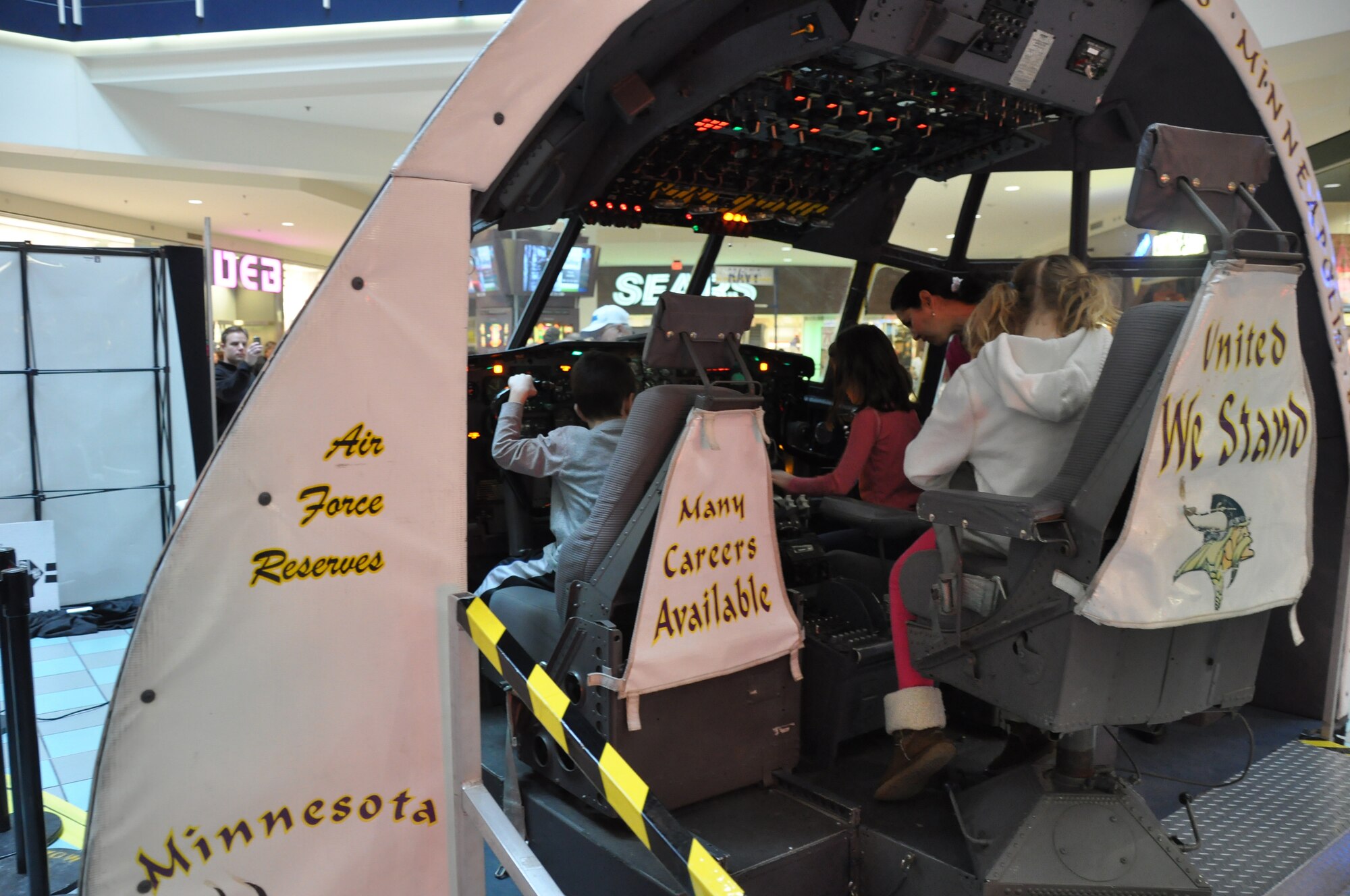 A C-130 cockpit on display at the Mall of America.(Air Force Photo/Tech. Sgt. Bob Sommer)