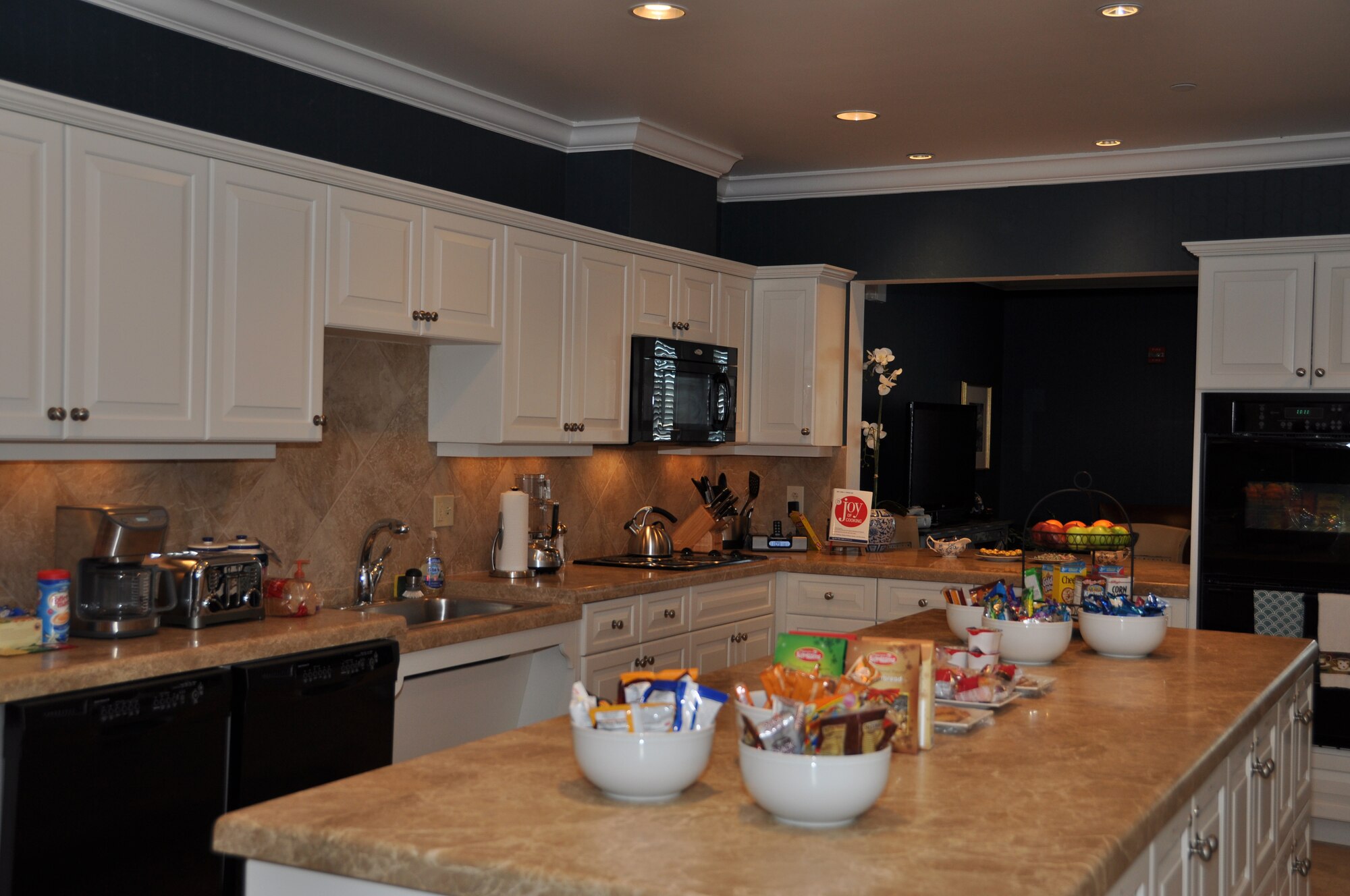 The kitchen of the Fisher House for Families of the Fallen is stocked with beverages, snacks and even meals for the families who stay there. The food drive held Jan. 29-30 brought in donations valued at more than $4,500. (U.S. Air Force photo/Christin Michaud)