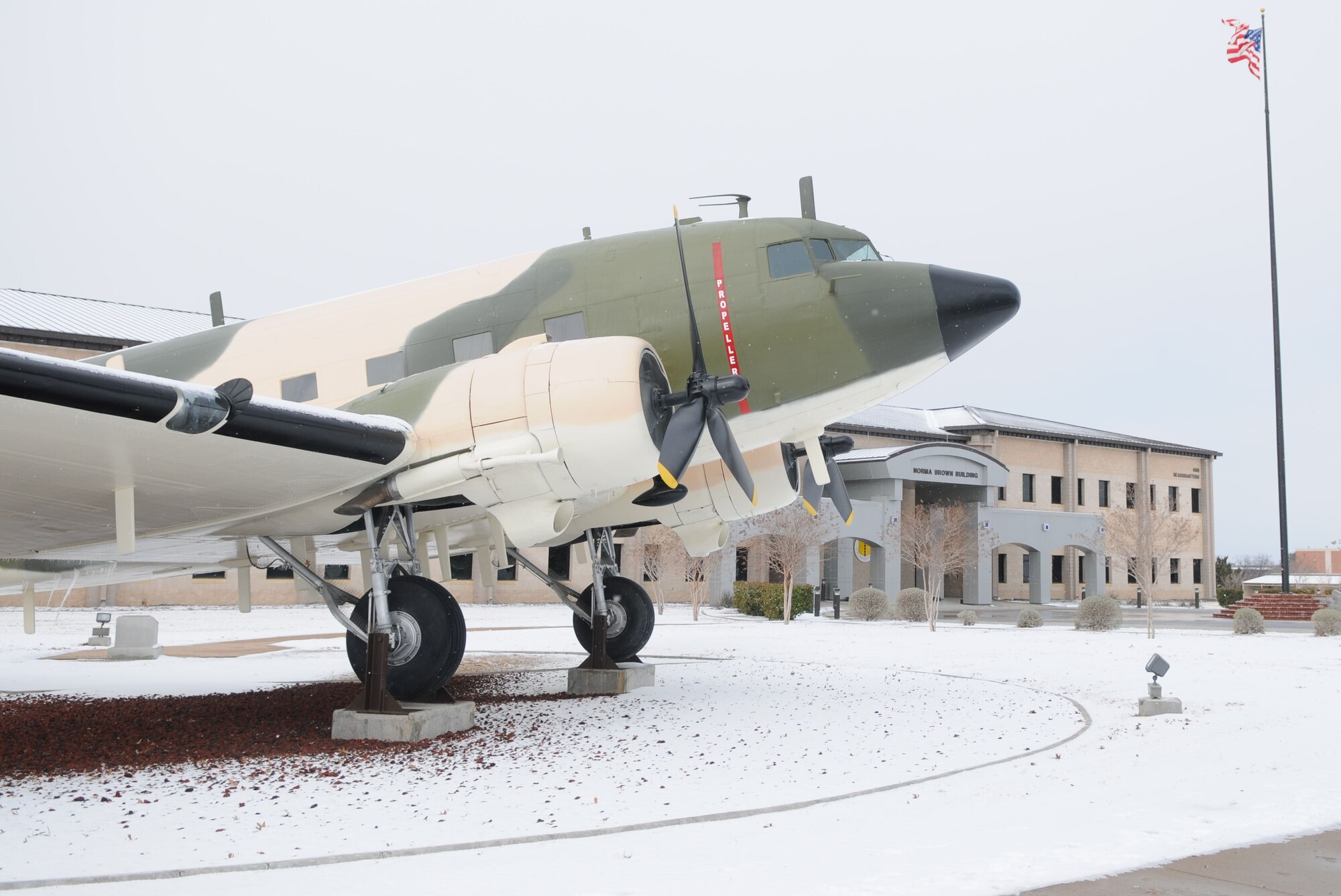 GOODFELLOW AIR FORCE BASE, Texas-  The Douglas EC-47Q Electric Goon static display here stands tall in the face of the nearly two inches of snow and ice, which blanketed Goodfellow Feb1. (U.S. Air Force photo/Staff Sgt. Heather Rodgers) 