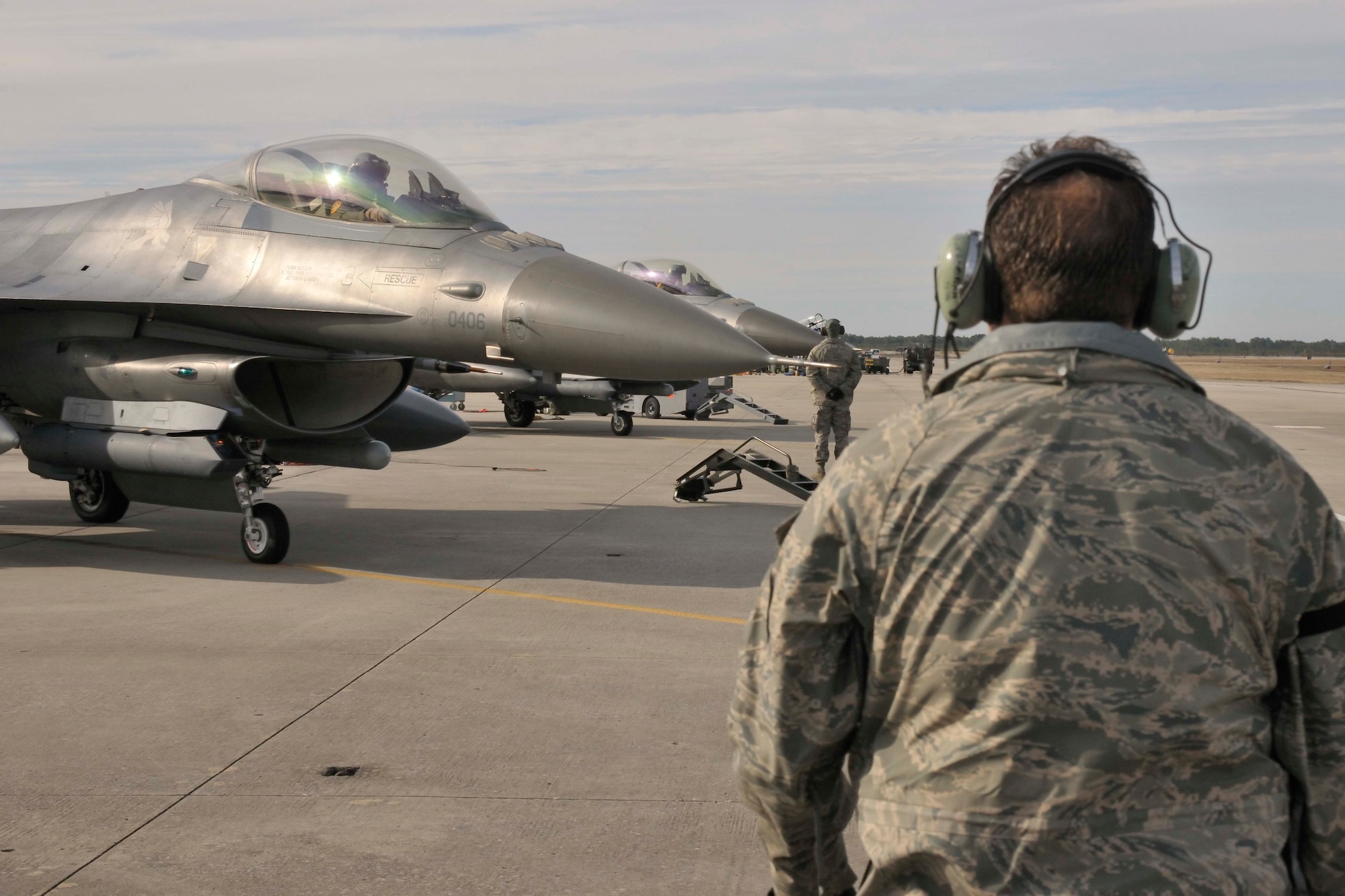 Maintainers from the 179th Fighter Squadron, a subordinate unit of the 148th Fighter Wing out of Duluth, Minn., prepare to launch F-16s for a mission at Tyndall Air Force Base, Fla., Jan. 27. The 148th FW is working with the 53rd Weapons Evaluation Group at Tyndall AFB for two weeks to train for their Air Sovereignty Alert missions and to validate their new Block 50 F-16s. (U.S. Air Force photo by Tech. Sgt. John Hoffmann)