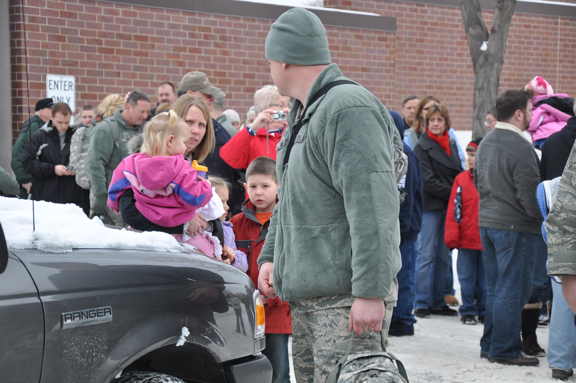 934th Civil Engineer Squdron members say goodbye to friends and family Jan. 29. The CE members headed to Ft. McCoy for combat skills training before leaving for Afghanistan. (Air Force Photo/Tech. Sgt. Bob Sommer) 