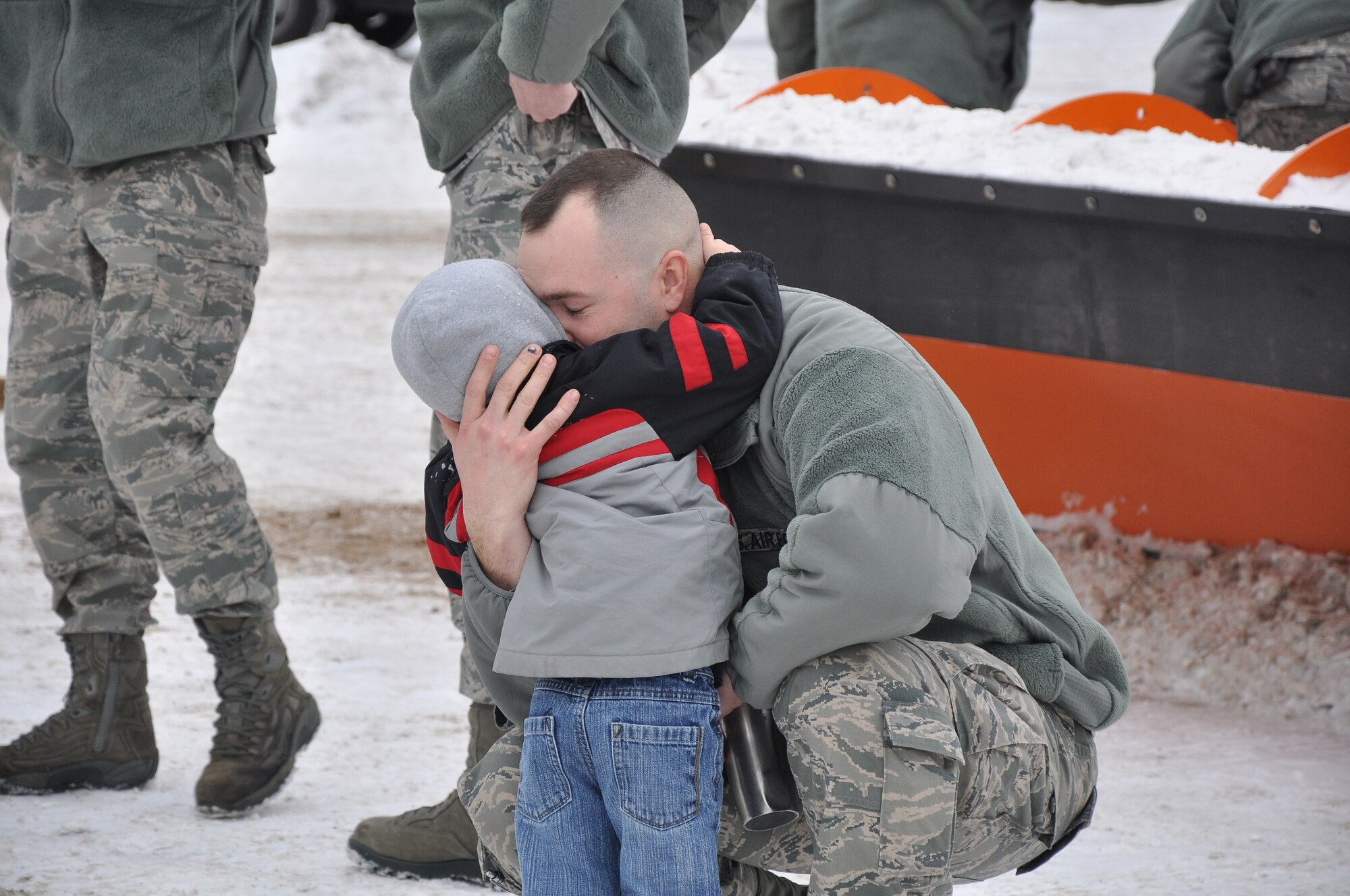 934th Civil Engineer Squdron members say goodbye to friends and family Jan. 29. The CE members headed to Ft. McCoy for combat skills training before leaving for Afghanistan. (Air Force Photo/Tech. Sgt. Bob Sommer) 