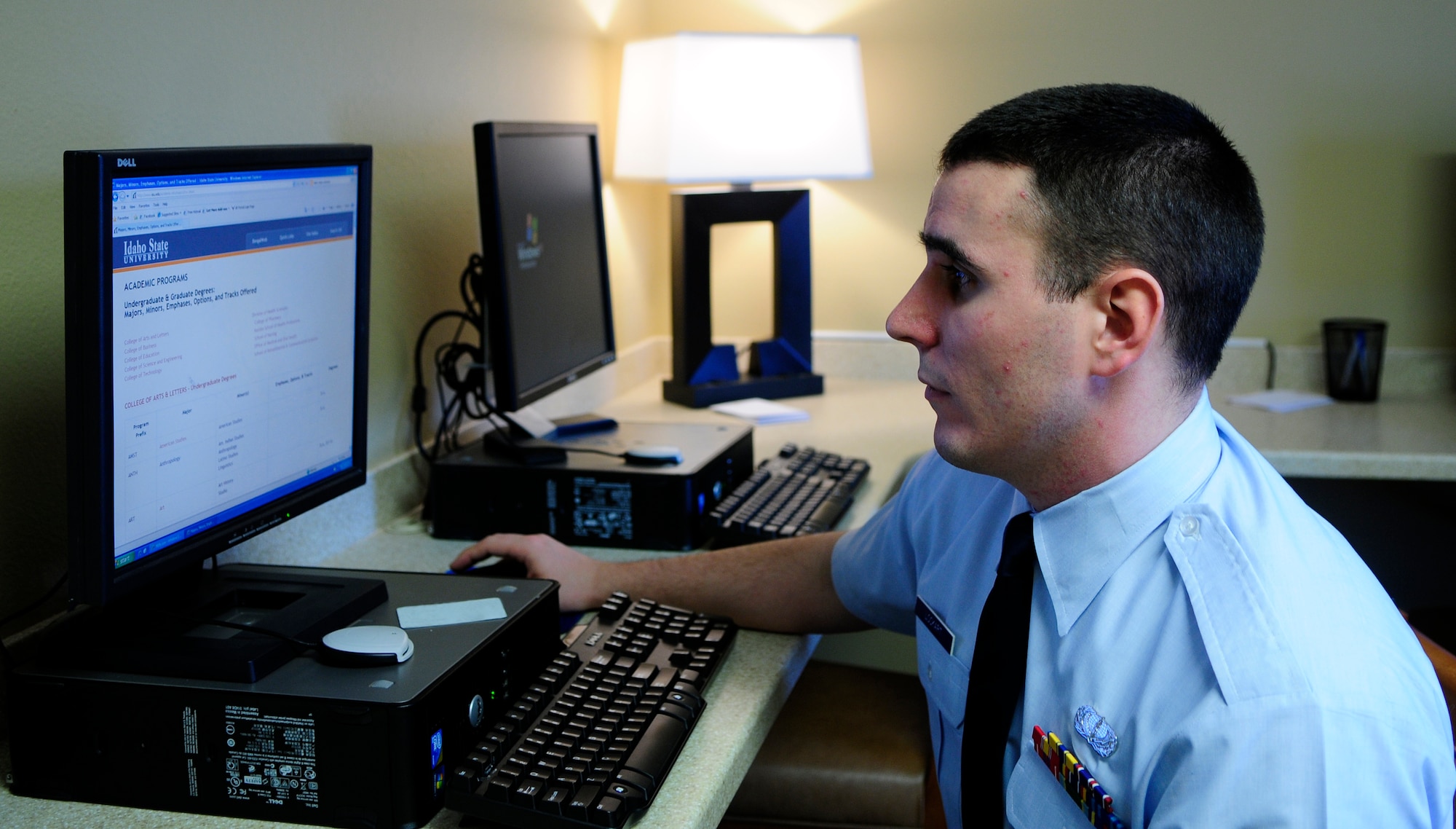 Staff Sgt. Michael Lockart browses the web in the newly renovated business center at the Gold Rush Inn Jan. 31, 2010, Eielson Air Force Base, Alaska.  The renovations were part of a larger beautification project within the hotel that also included the lobby area.  Sergeant Lockart is assigned to the 354th Force Support Squadron as guest services manager.  (U.S. Air Force photo by/Airman 1st Class Yash Rojas)