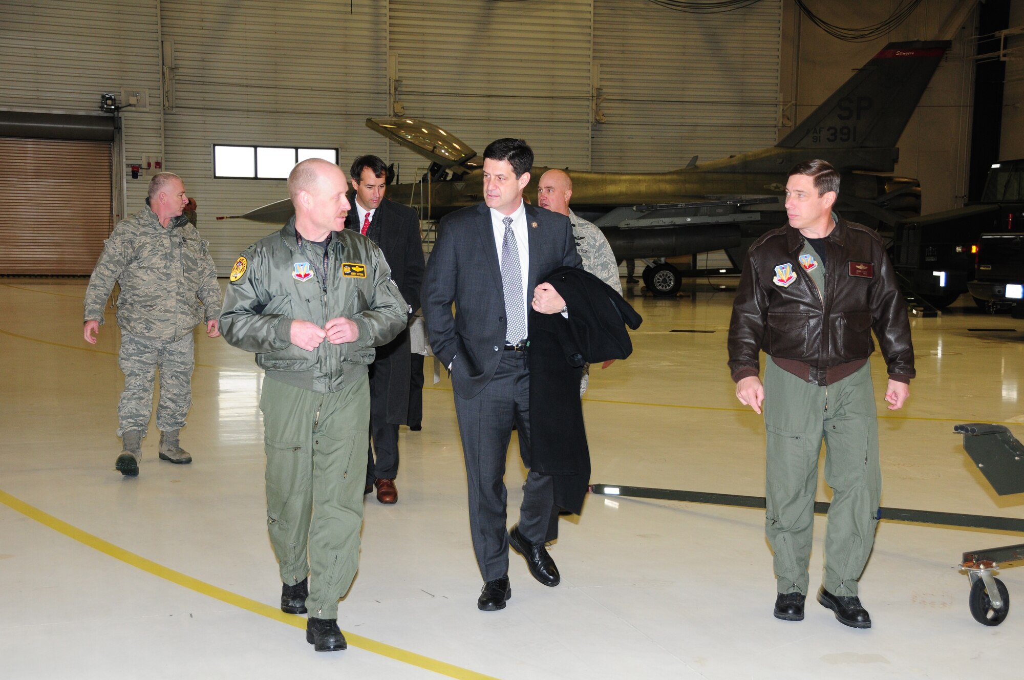 Col. Gerald Ostern, 148th Fighter Wing, Operations Group Commander (left) and Col. Frank Stokes, 148th Fighter Wing, Wing Commander (right) talk with Congressman Cravaack while touring the 148th Fighter Wing in Duluth, Minn.  Congressman Cravaack is visiting the 148th FW less than one month after being sworn into office.  (U.S. Air Force photo by Master Sgt. Ralph J. Kapustka)  