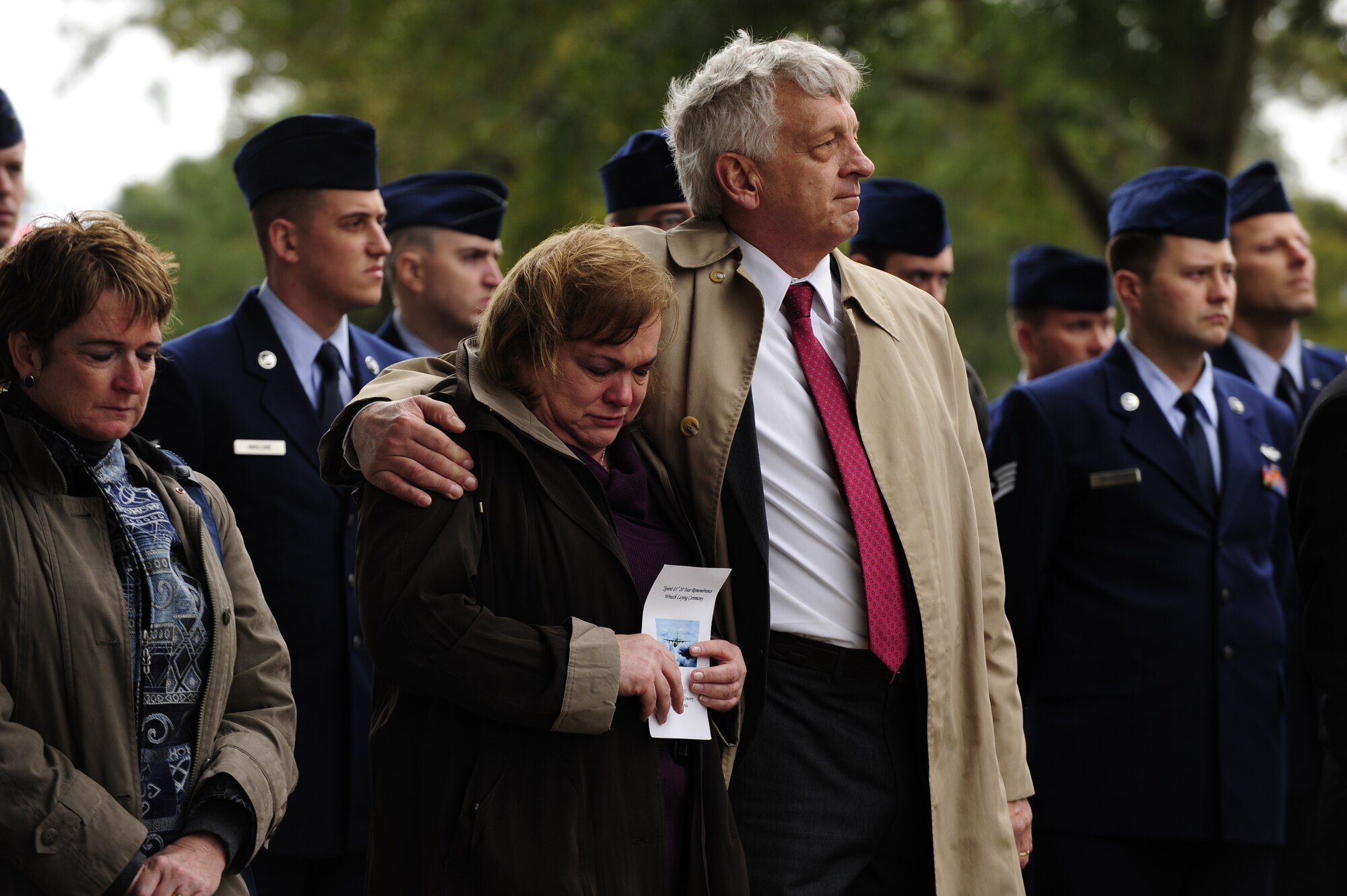 Family members of the Spirit 03 crew mourn during a wreath-laying ceremony Jan. 31, 2011, at the Barrancas National Cemetery, Pensacola Naval Air Station, Fla. The ceremony marked the 20th anniversary of when 14 Airmen lost their lives when Spirit 03, an AC-130H Spectre gunship, was shot down by enemy fire in support of Operation Desert Storm Jan. 31, 1991. (U.S. Air Force photo by Staff Sgt. Julianne M. Showalter/Released)