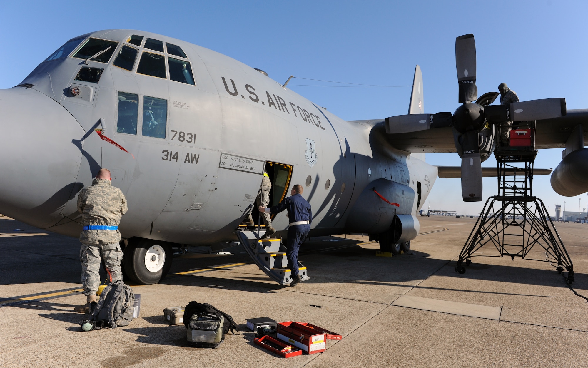 Airmen from the 314th Airlift Wing work on a C-130 Jan. 26, 2011, while being inspected by an inspector general team on the flightline at Little Rock Air Force Base, Ark.  The 314th Airlift Wing was inspected Jan. 25 - 31, 2011. (Air Force Photo by Airman 1st Class Ellora Stewart)