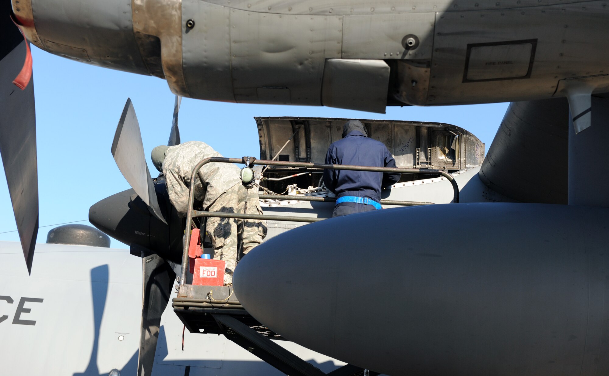 Airmen from the 314th Airlift Wing, inspect a C-130 engine Jan. 26, 2011, during an inspection by the inspector general on the flightline at Little Rock Air Force Base, Ark. The 314th Airlift Wing received an excellent rating from Air Education and Training Command inspectors. (Air Force photo by Airman 1st Class Ellora Stewart)